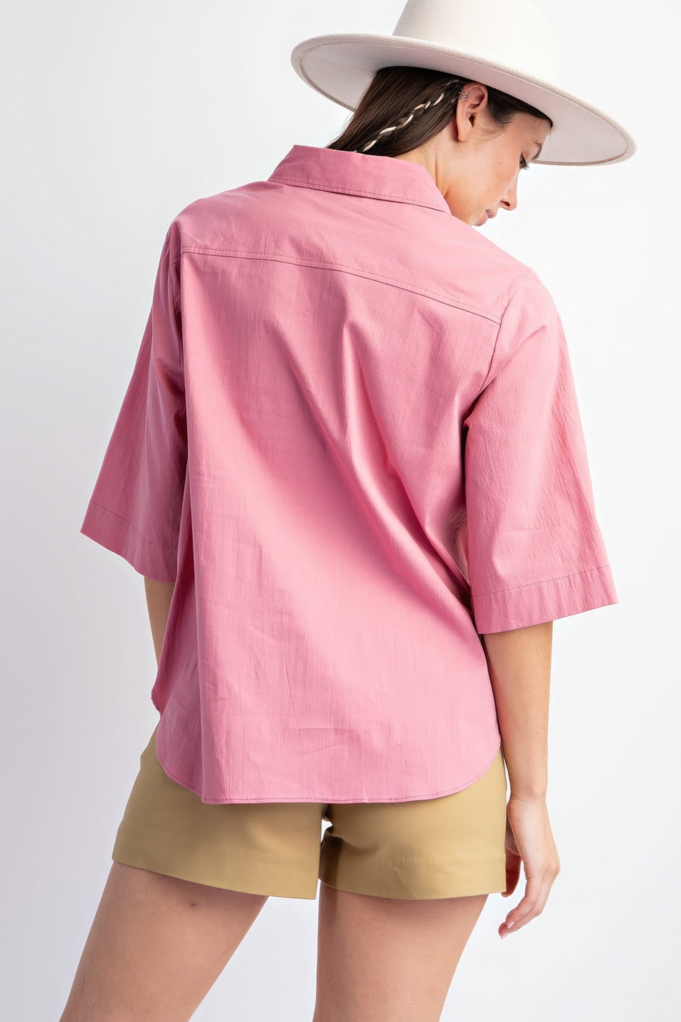 The Demi is our half sleeves stretch poplin button down shirt. It is a versatile choice that seamlessly combines style with comfort. Perfect for all-day wear, this shirt is ideal for casual outings or work. Fabric: Crafted from a blend of 97% Cotton and 3% Spandex. Colour: Pink.