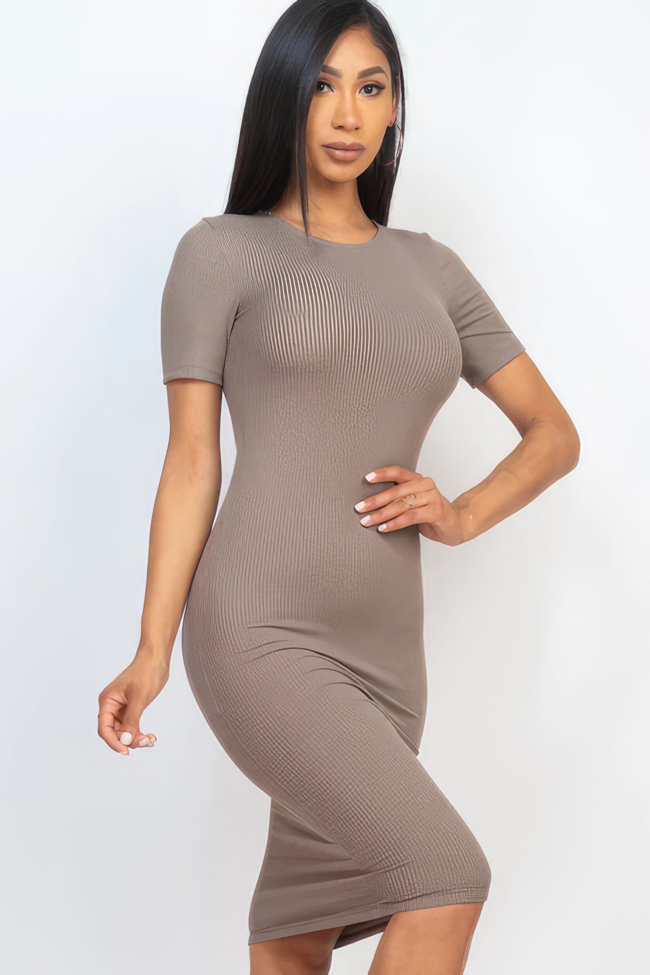 Introducing The Sarah, a sophisticated and versatile addition to your wardrobe that seamlessly combines comfort and style. This midi dress, available in a sophisticated Taupe colour, is crafted from a blend of 92% Polyester and 8% Spandex, to give you a flattering silhouette. Perfect for a night out, special events, or any occasion where you want to make a statement.