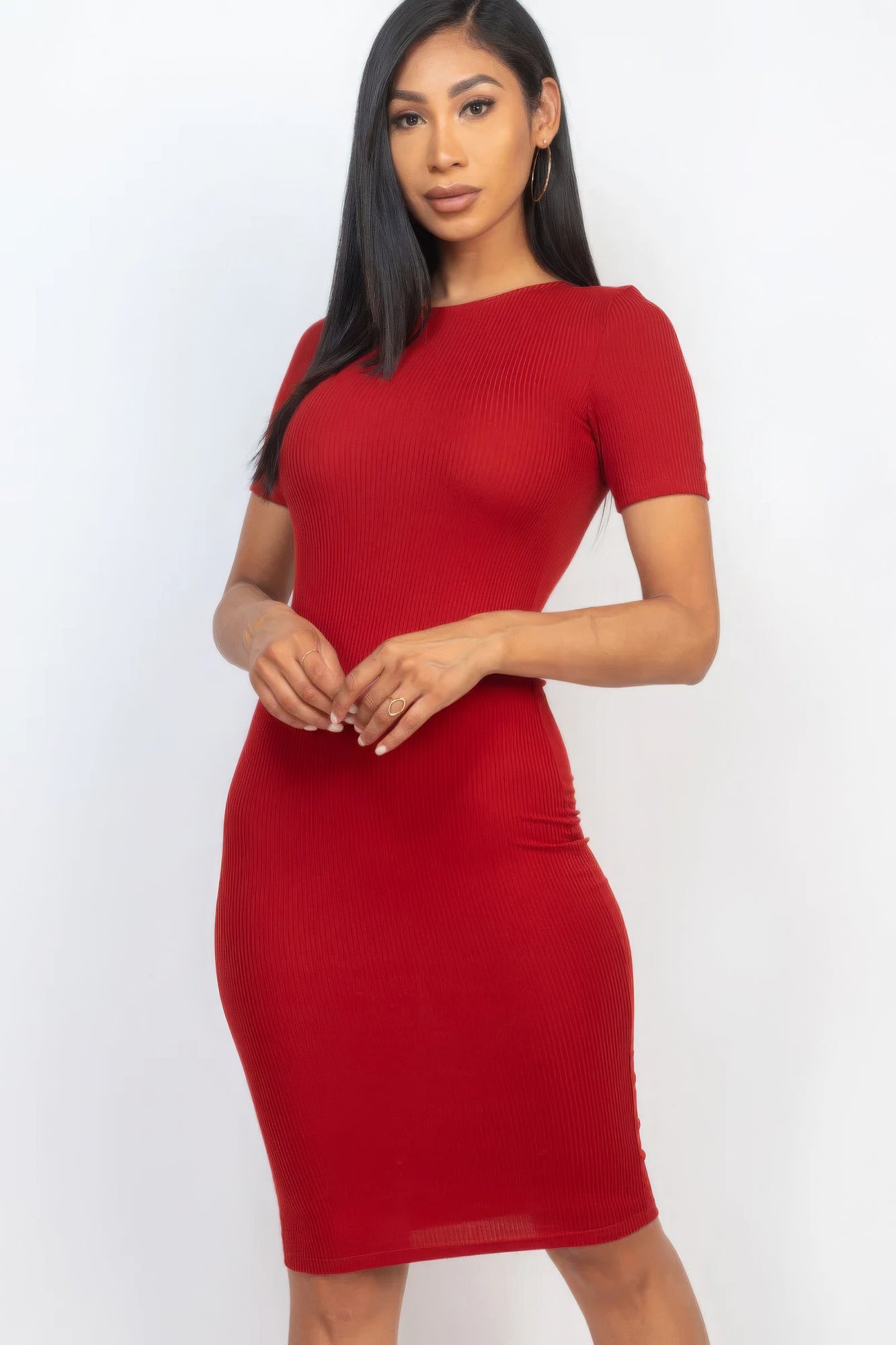 Introducing The Sarah, a sophisticated and versatile addition to your wardrobe that seamlessly combines comfort and style. This midi dress, available in a rich wine red colour, is crafted from a blend of 92% Polyester and 8% Spandex, to give you a flattering silhouette. Perfect for a night out, special events, or any occasion where you want to make a statement.