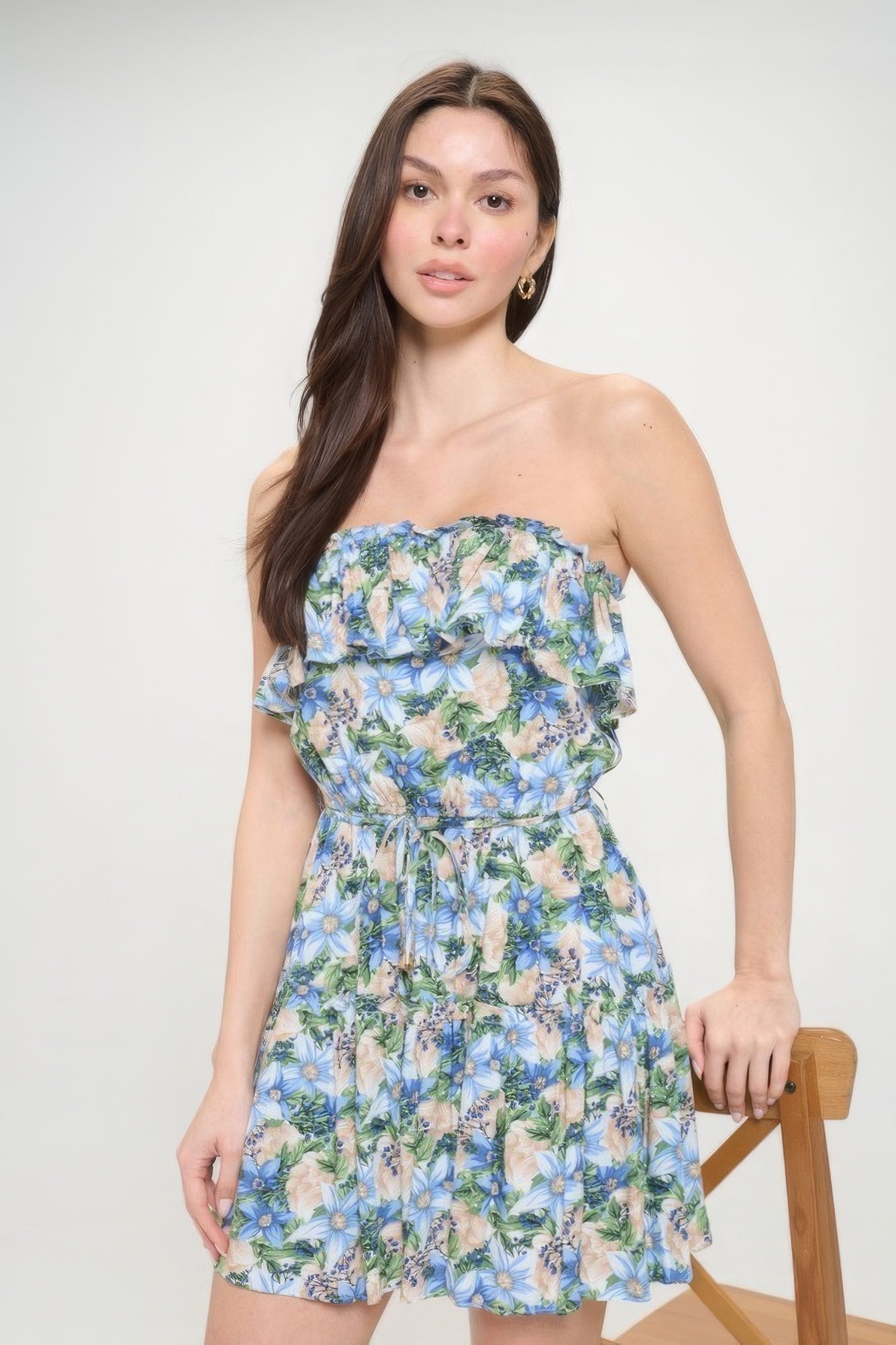 Elevate your wardrobe with The Florence, a chic and versatile piece that effortlessly combines style and comfort. Crafted with the utmost care and attention to detail, this dress is designed to make you look and feel your best. It is made from a luxurious blend of 100% Rayon, ensuring comfort and durability. Available in a beautiful and elegant blue beige colour. The Florence has a unique feminine floral print and is perfect for a casual day out, a night out with friends, or a special occasion.