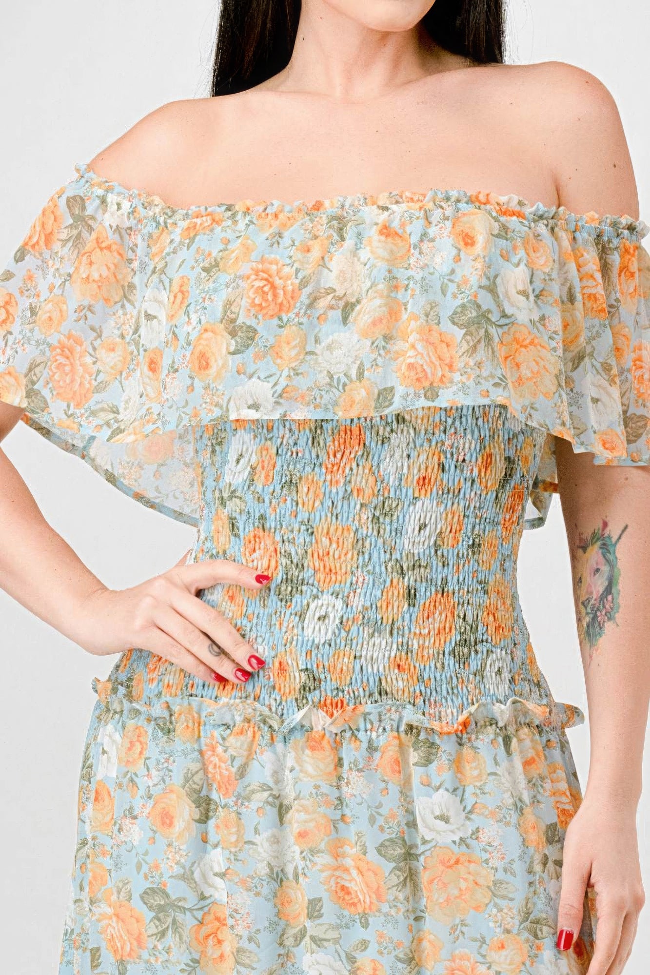 Elevate your wardrobe with The Sage, our floral chiffon maxi dress. It is a stunning piece that exudes elegance and grace. Crafted from 100% Polyester, this dress offers a lightweight and luxurious feel for all-day comfort. Made from high-quality chiffon fabric, The Sage ensures a delicate and flowy silhouette. It features an off-shoulder neckline with a smocked back and ruffled tiered detailing, offering a romantic and feminine look. Perfect for a range of occasions.