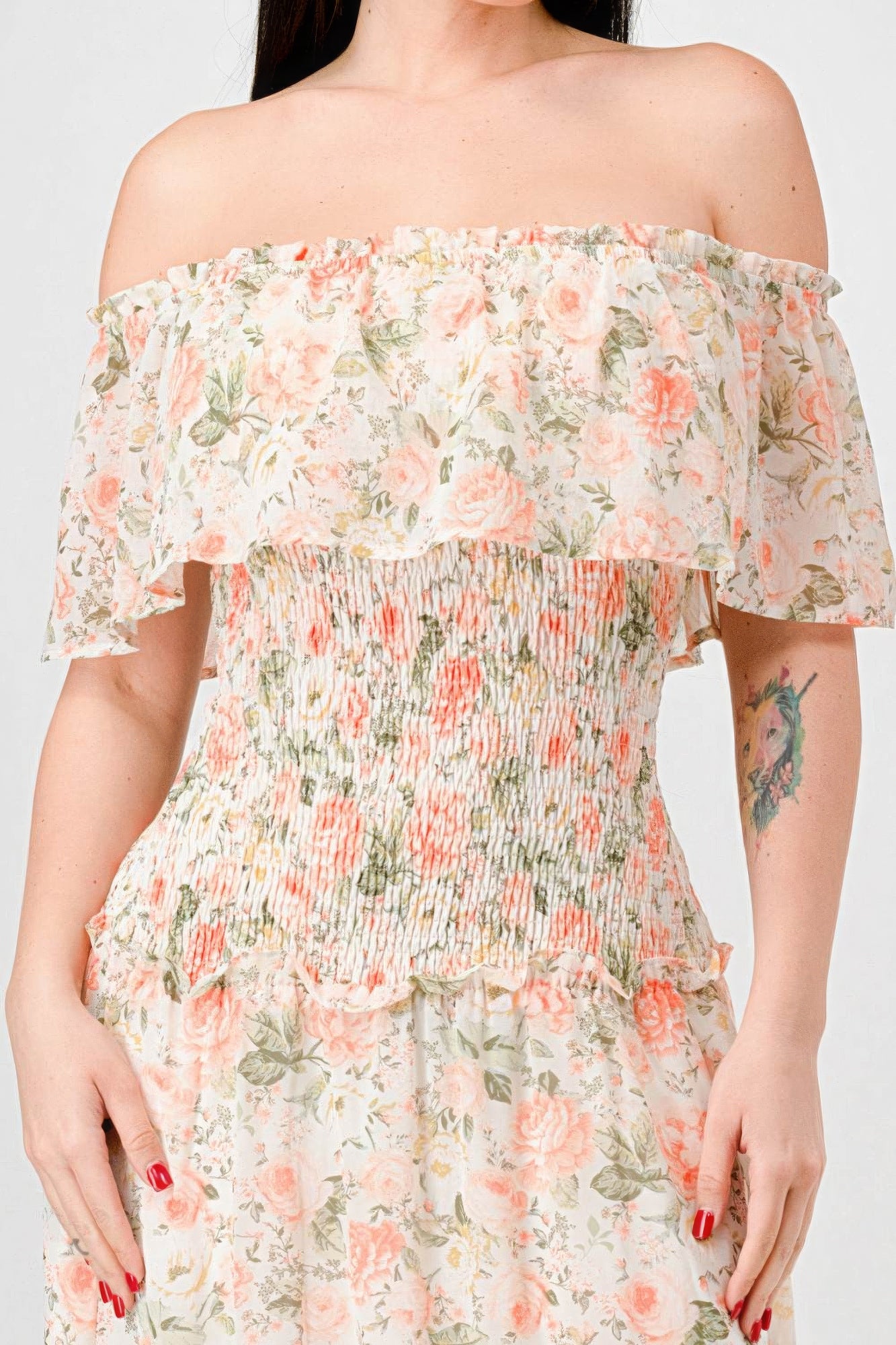Elevate your wardrobe with The Sage, our floral chiffon maxi dress. It is a stunning piece that exudes elegance and grace. Crafted from 100% Polyester, this dress offers a lightweight and luxurious feel for all-day comfort. Made from high-quality chiffon fabric, The Sage ensures a delicate and flowy silhouette. It features an off-shoulder neckline with a smocked back and ruffled tiered detailing, offering a romantic and feminine look. Perfect for a range of occasions, from garden parties to beach weddings.