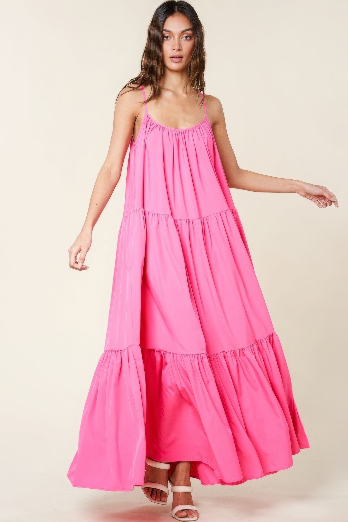 The Tessa is our maxi sun dress with pockets. It features adjustable straps and an extra-wide A-line silhouette. Perfect for beach outings, vacations, or casual gatherings. Fabric: Made from 100% polyester. Colour: pink.