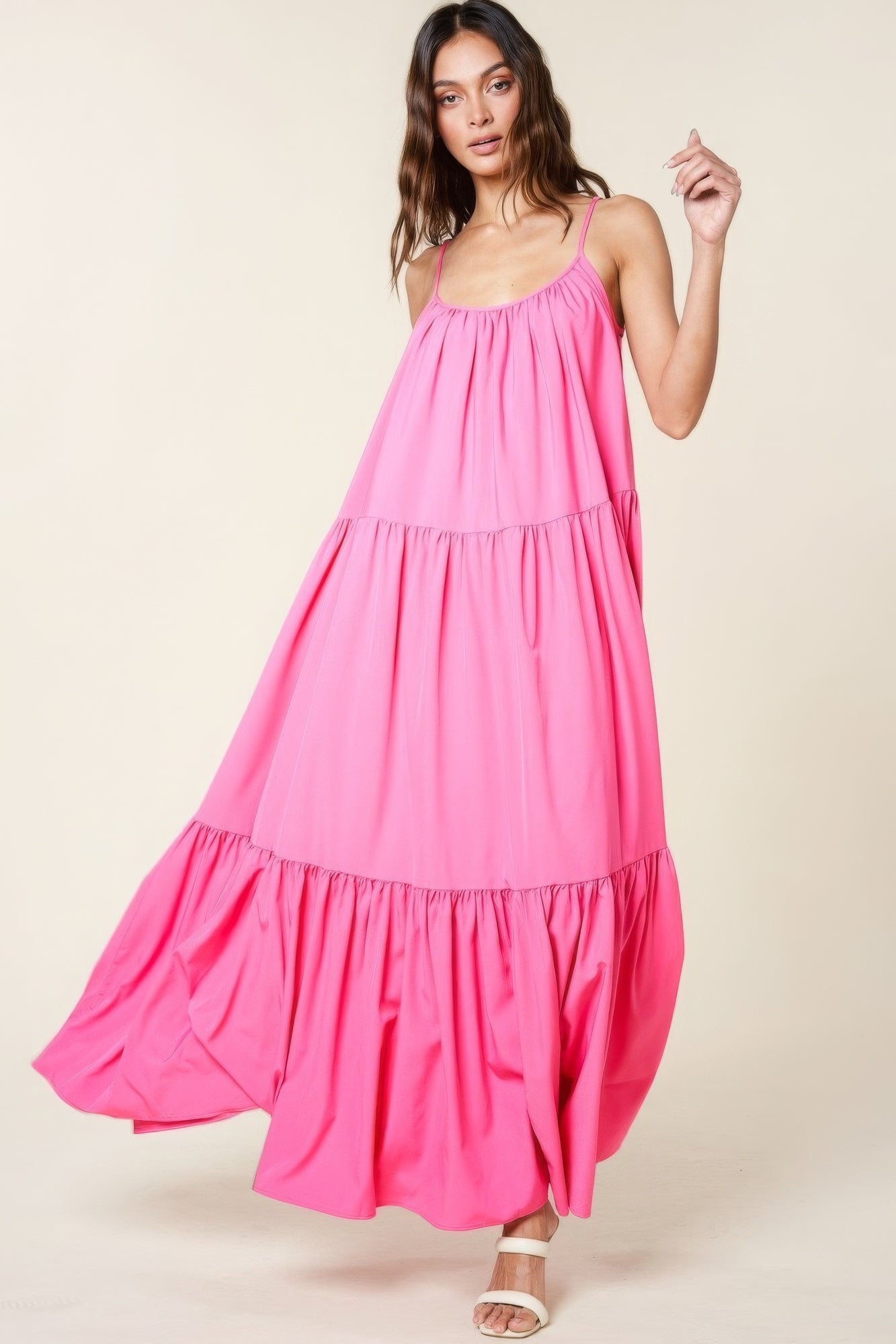 The Tessa is our maxi sun dress with pockets. It features adjustable straps and an extra-wide A-line silhouette. Perfect for beach outings, vacations, or casual gatherings. Fabric: Made from 100% polyester. Colour: pink.