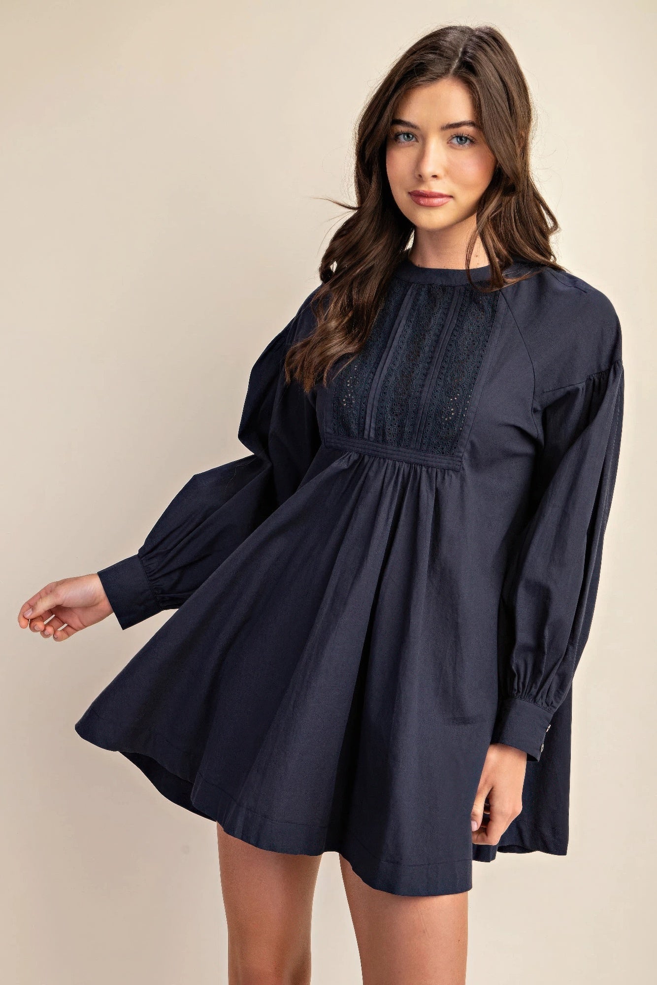 The Lacy is our long sleeve mini dress with a beautiful lace detail. Crafted from high-quality cotton, this elegant dress combines a classic design with contemporary comfort and a luxurious feel. Perfect for casual outings, evening events, or any occasion where you want to look stylish and feel comfortable. Fabric: Made from 100% cotton. Colour: navy.