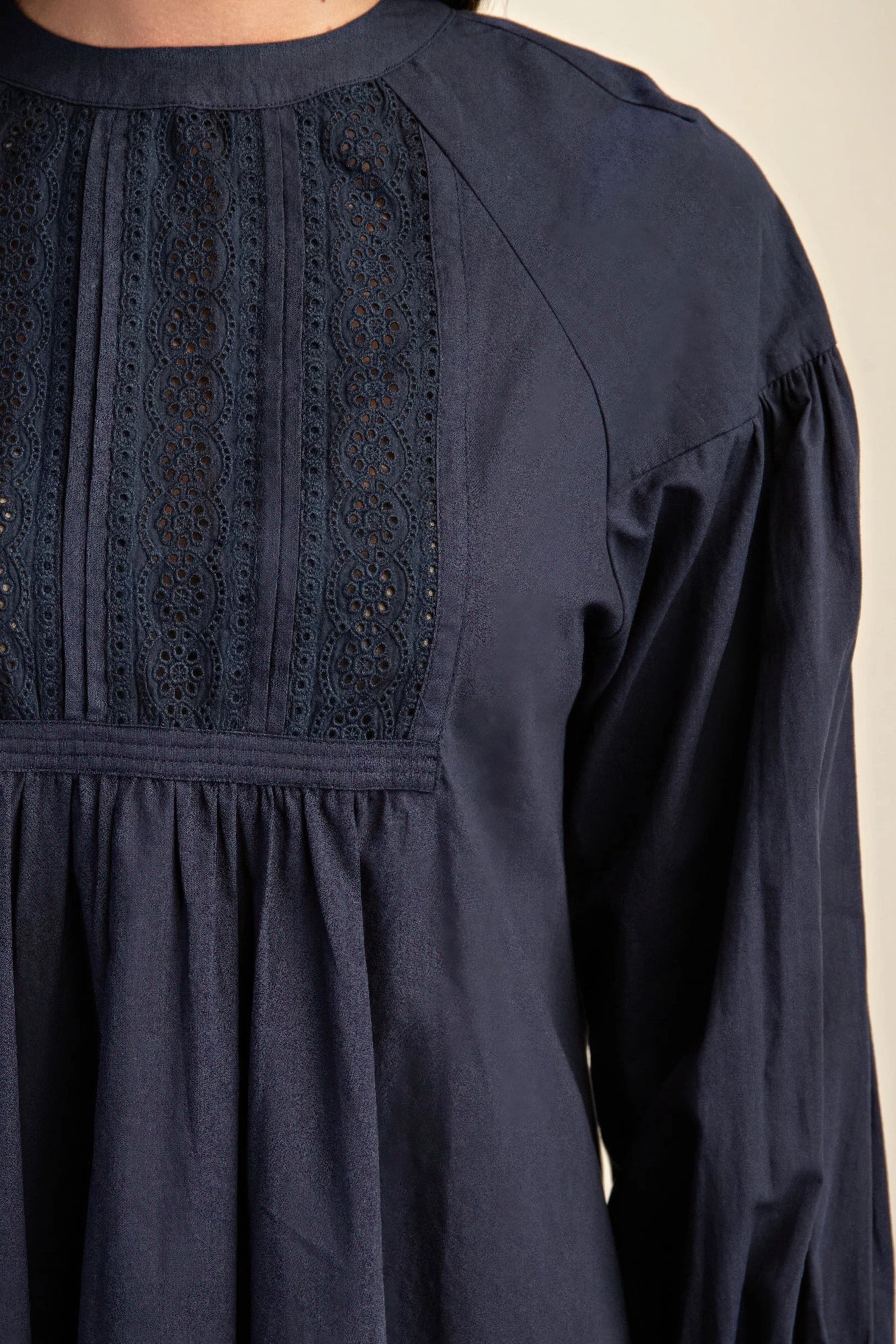 The Lacy is our long sleeve mini dress with a beautiful lace detail. Crafted from high-quality cotton, this elegant dress combines a classic design with contemporary comfort and a luxurious feel. Perfect for casual outings, evening events, or any occasion where you want to look stylish and feel comfortable. Fabric: Made from 100% cotton. Colour: navy.