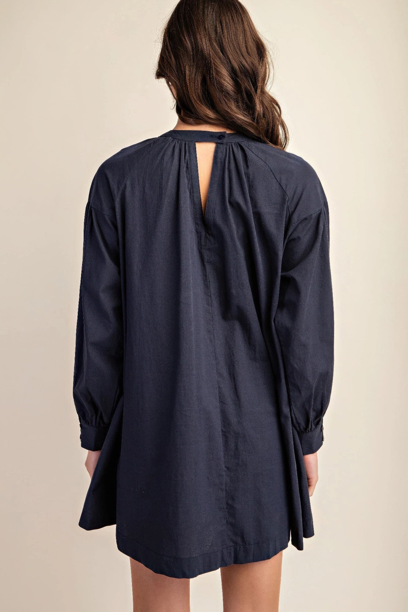 The Lacy is our long sleeve mini dress with a beautiful lace detail. Crafted from high-quality cotton, this elegant dress combines a classic design with contemporary comfort and a luxurious feel. Perfect for casual outings, evening events, or any occasion where you want to look stylish and feel comfortable. Fabric: Made from 100% cotton. Colour: navy.