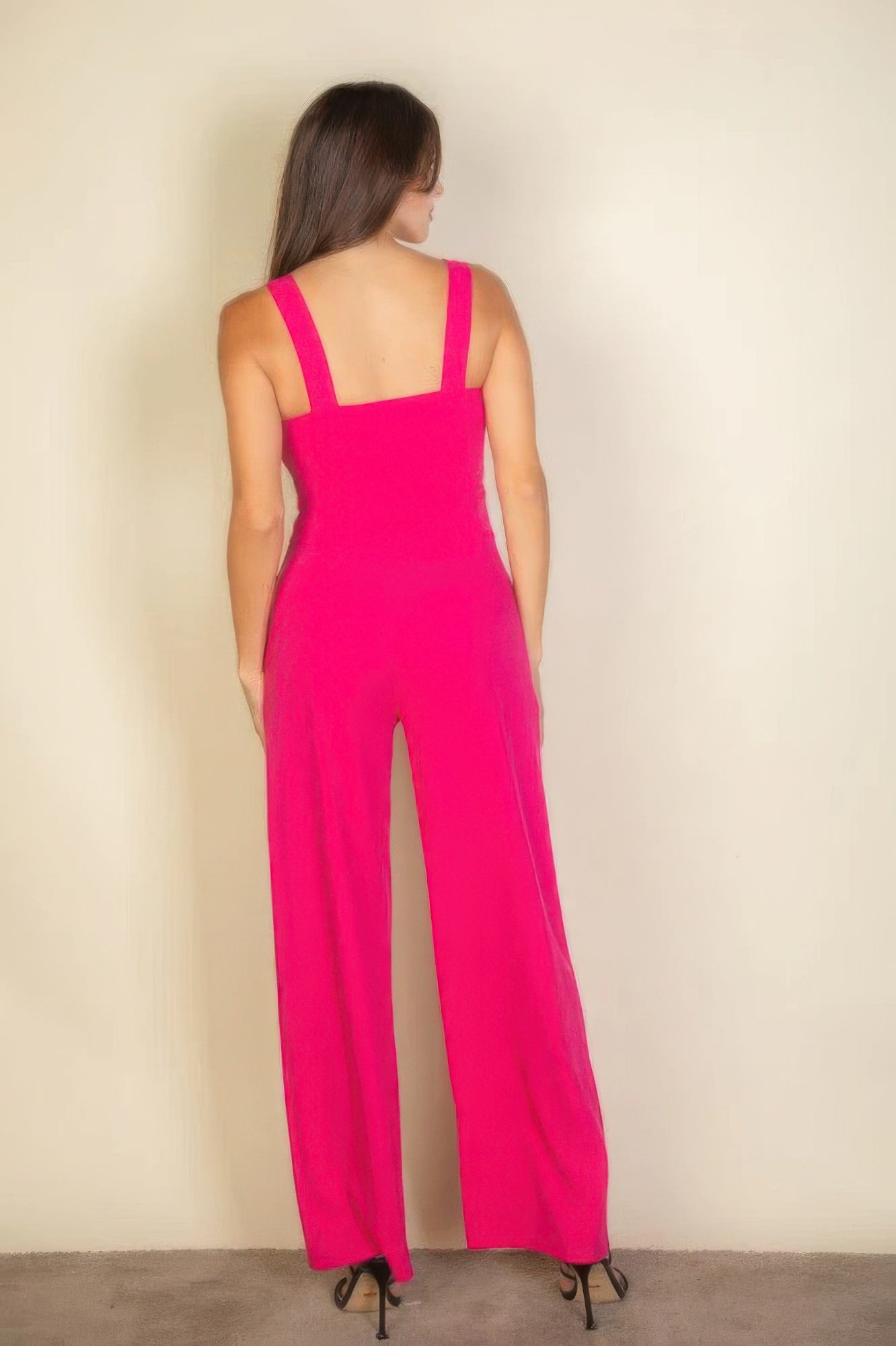 The Jane is our notched neck cami jumpsuit which combines comfort with a chic design. Its soft, stretchy fabric ensures a flattering fit and all-day comfort, making it ideal for casual outings, daily wear, or special occasions. Fabric: Made from 96% polyester and 4% spandex. Colour: Fuchsia.