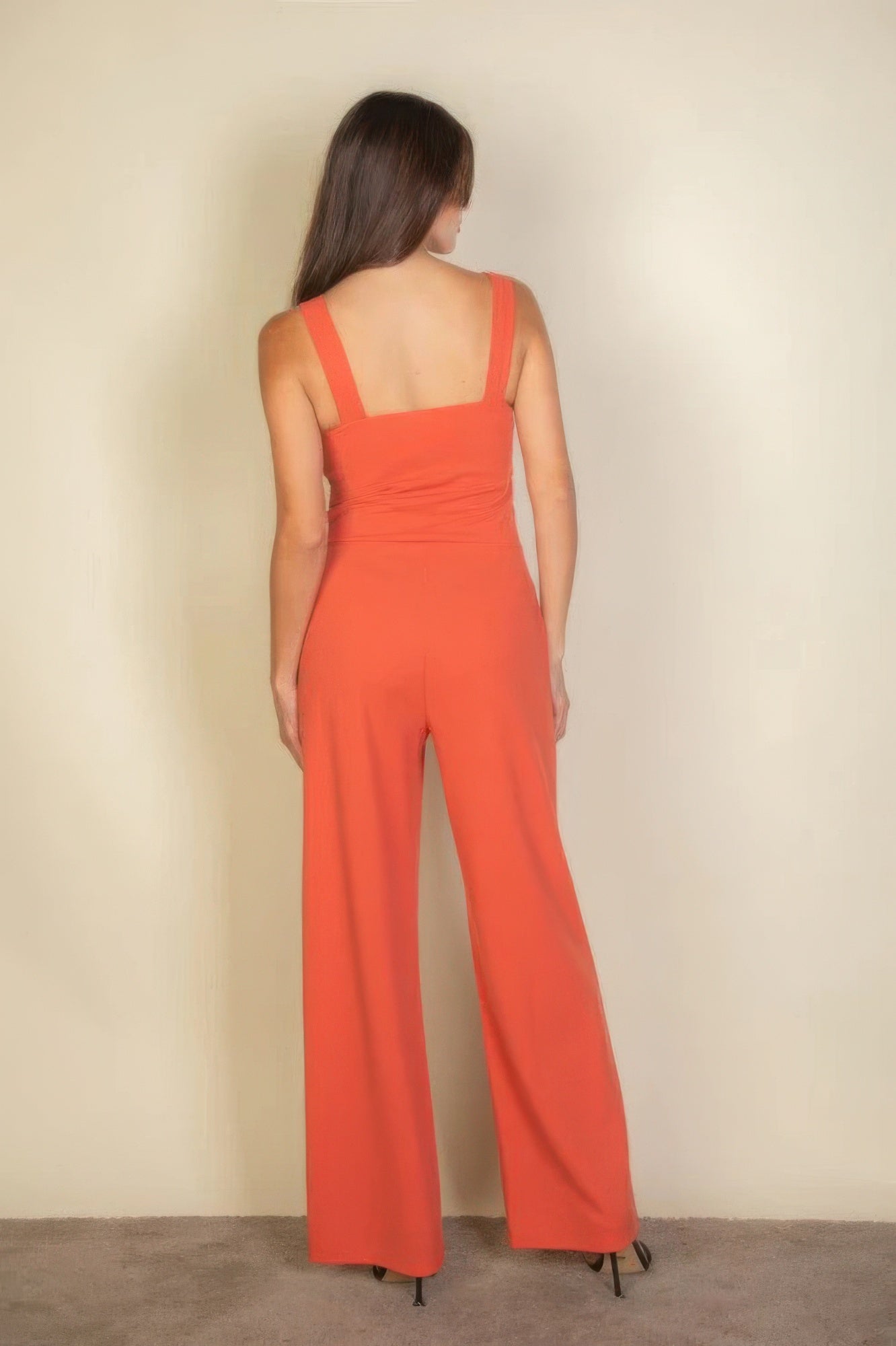 The Jane is our notched neck cami jumpsuit which combines comfort with a chic design. Its soft, stretchy fabric ensures a flattering fit and all-day comfort, making it ideal for casual outings, daily wear, or special occasions. Fabric: Made from 96% polyester and 4% spandex. Colour: Rust.