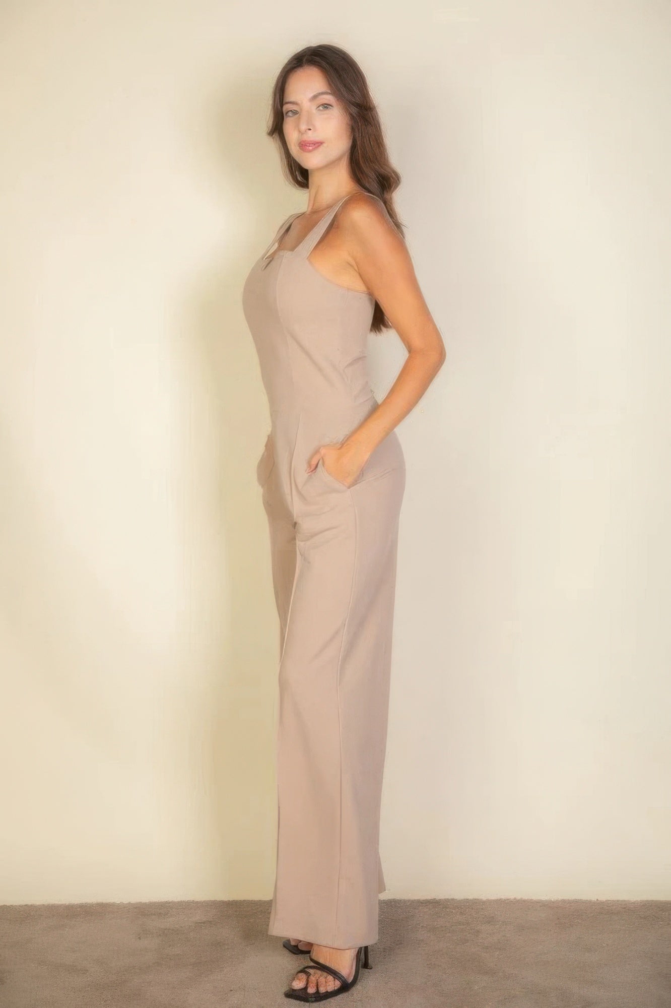 The Jane is our notched neck cami jumpsuit which combines comfort with a chic design. Its soft, stretchy fabric ensures a flattering fit and all-day comfort, making it ideal for casual outings, daily wear, or special occasions. Fabric: Made from 96% polyester and 4% spandex. Colour: Taupe.