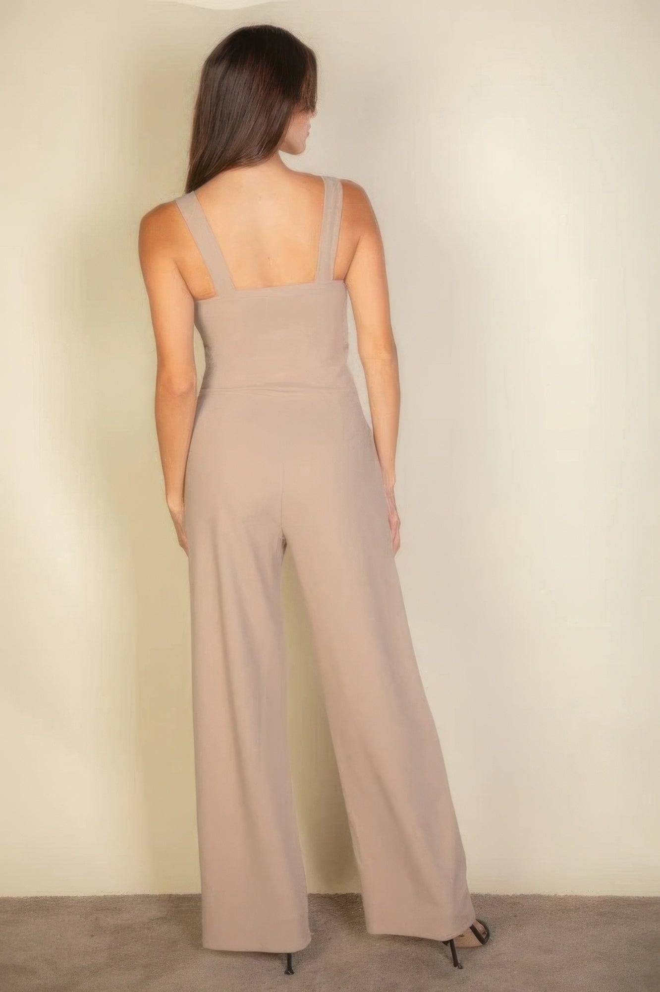 The Jane is our notched neck cami jumpsuit which combines comfort with a chic design. Its soft, stretchy fabric ensures a flattering fit and all-day comfort, making it ideal for casual outings, daily wear, or special occasions. Fabric: Made from 96% polyester and 4% spandex. Colour: Taupe.