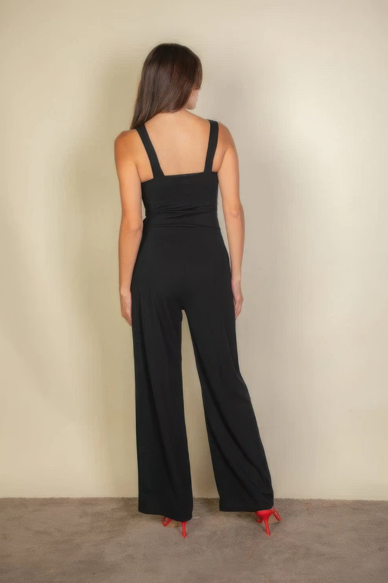 The Jane is our notched neck cami jumpsuit which combines comfort with a chic design. Its soft, stretchy fabric ensures a flattering fit and all-day comfort, making it ideal for casual outings, daily wear, or special occasions. Fabric: Made from 96% polyester and 4% spandex. Colour: black.