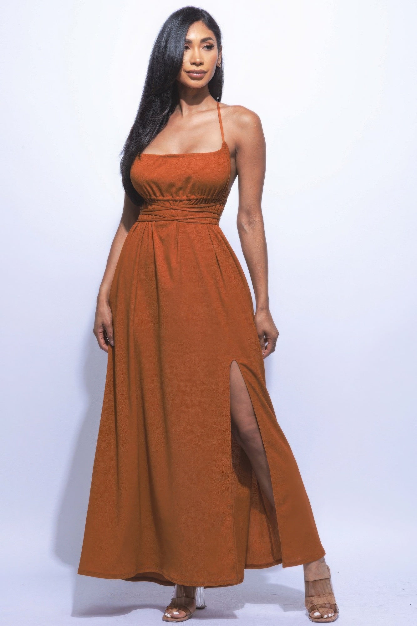 The Naomi is our gorgeous side slit maxi dress. It is designed to make you look and feel your best. It features a strappy sexy tie back and it is perfect for evening events. Fabric: Made from 92% polyester and 8% spandex. Colour: Mocha.