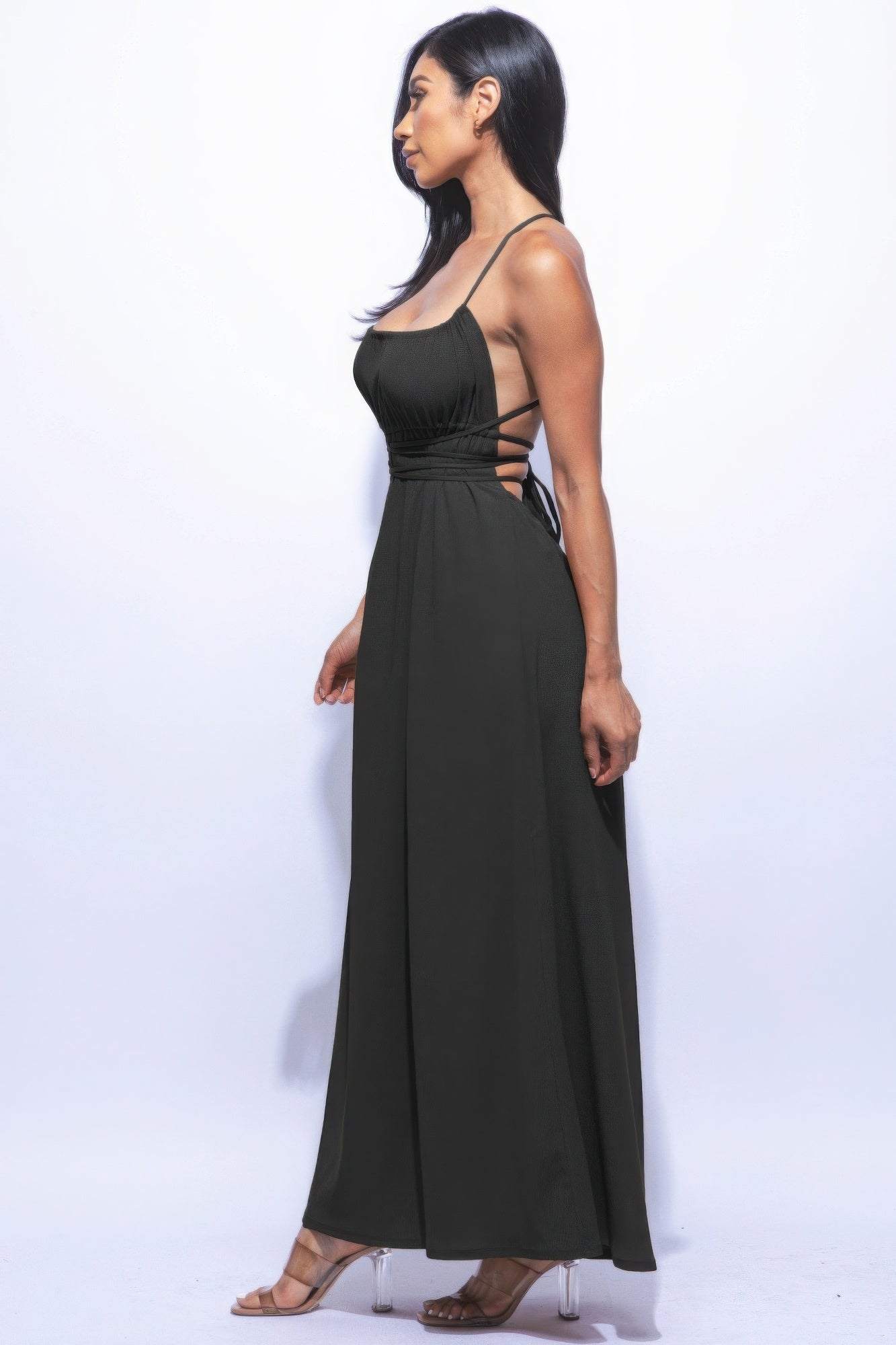 The Naomi is our gorgeous side slit maxi dress. It is designed to make you look and feel your best. It features a strappy sexy tie back and it is perfect for evening events. Fabric: Made from 92% polyester and 8% spandex. Colour: black.