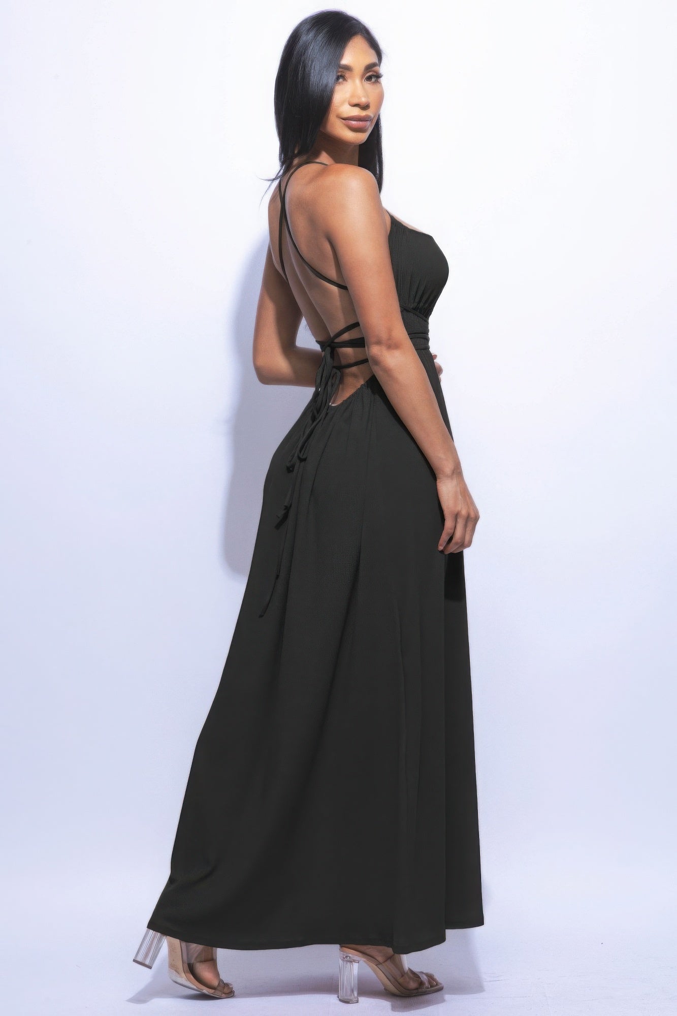 The Naomi is our gorgeous side slit maxi dress. It is designed to make you look and feel your best. It features a strappy sexy tie back and it is perfect for evening events. Fabric: Made from 92% polyester and 8% spandex. Colour: black.
