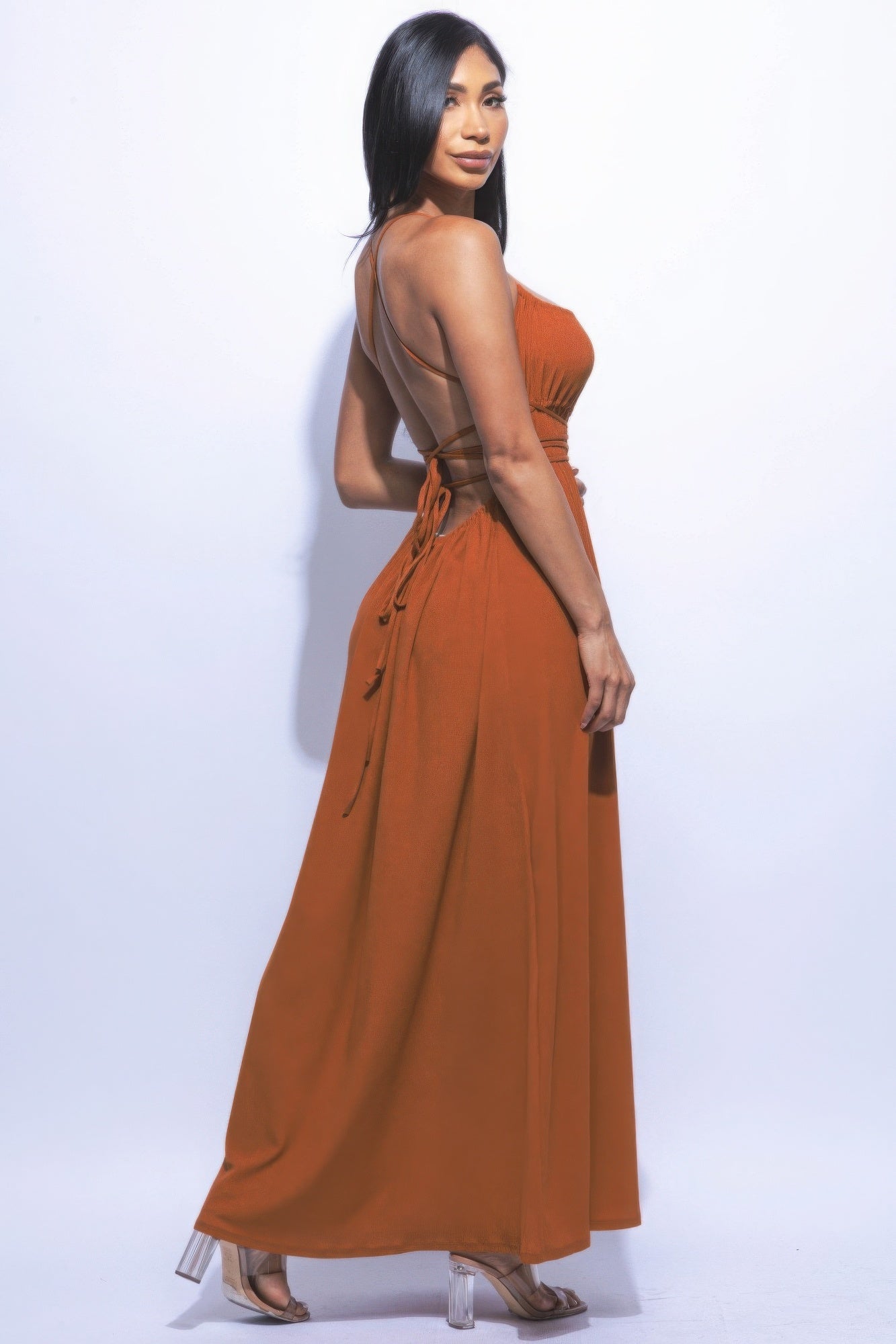 The Naomi is our gorgeous side slit maxi dress. It is designed to make you look and feel your best. It features a strappy sexy tie back and it is perfect for evening events. Fabric: Made from 92% polyester and 8% spandex. Colour: Mocha.