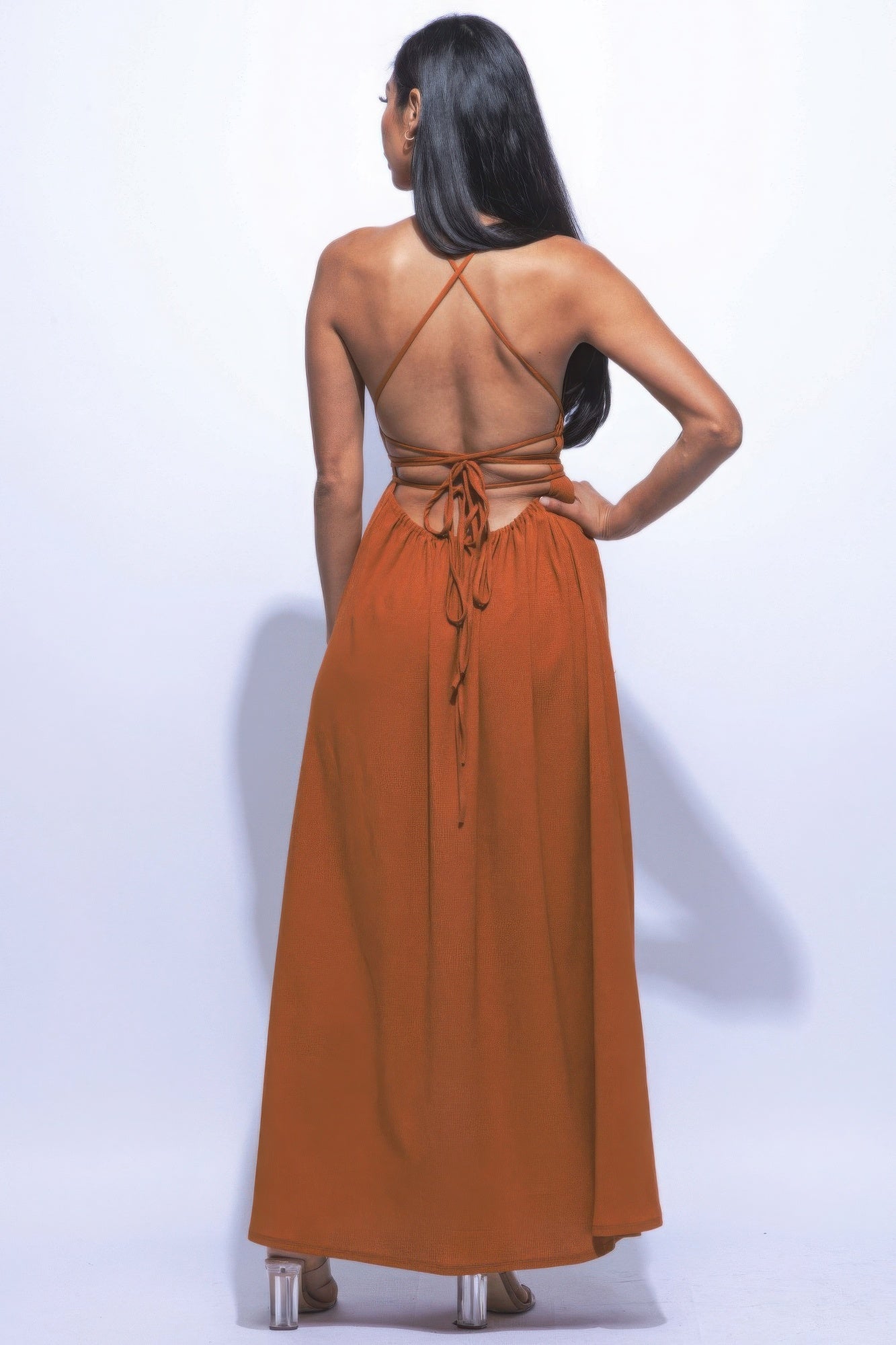 The Naomi is our gorgeous side slit maxi dress. It is designed to make you look and feel your best. It features a strappy sexy tie back and it is perfect for evening events. Fabric: Made from 92% polyester and 8% spandex. Colour: Mocha.