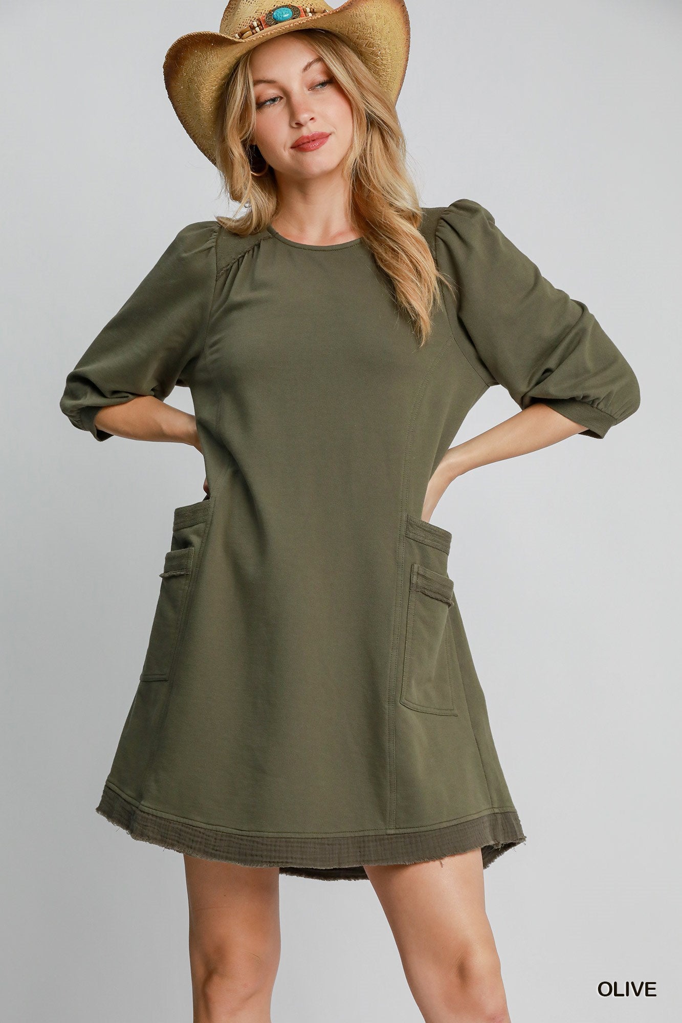 The Terry is a mini dress crafted from soft French Terry fabric. It offers a perfect blend of comfort and style. It features double pockets, frayed trim details and a relaxed fit. The dress is not lined making it lightweight and ideal for layering. Fabric: 100% cotton. Colour: olive.