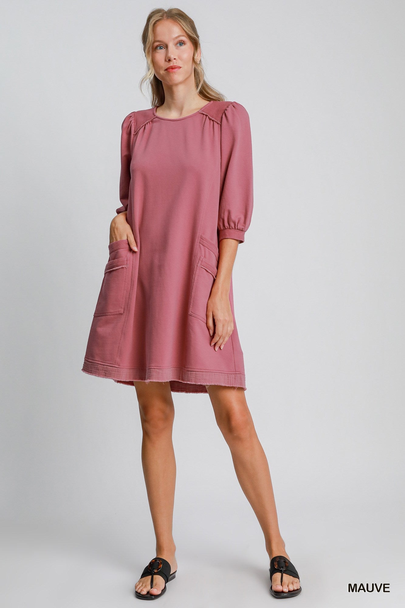 The Terry is a mini dress crafted from soft French Terry fabric. It offers a perfect blend of comfort and style. It features double pockets, frayed trim details and a relaxed fit. The dress is not lined making it lightweight and ideal for layering. Fabric: 100% cotton. Colour: mauve.