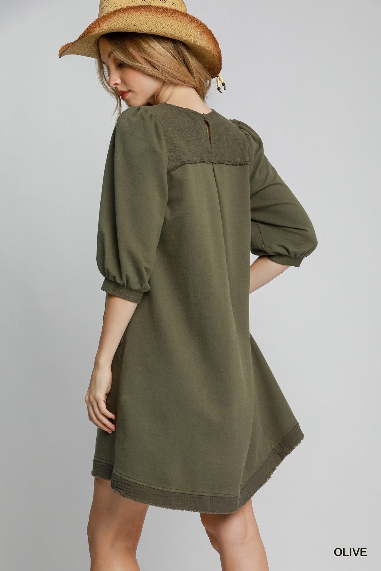 The Terry is a mini dress crafted from soft French Terry fabric. It offers a perfect blend of comfort and style. It features double pockets, frayed trim details and a relaxed fit. The dress is not lined making it lightweight and ideal for layering. Fabric: 100% cotton. Colour: olive.