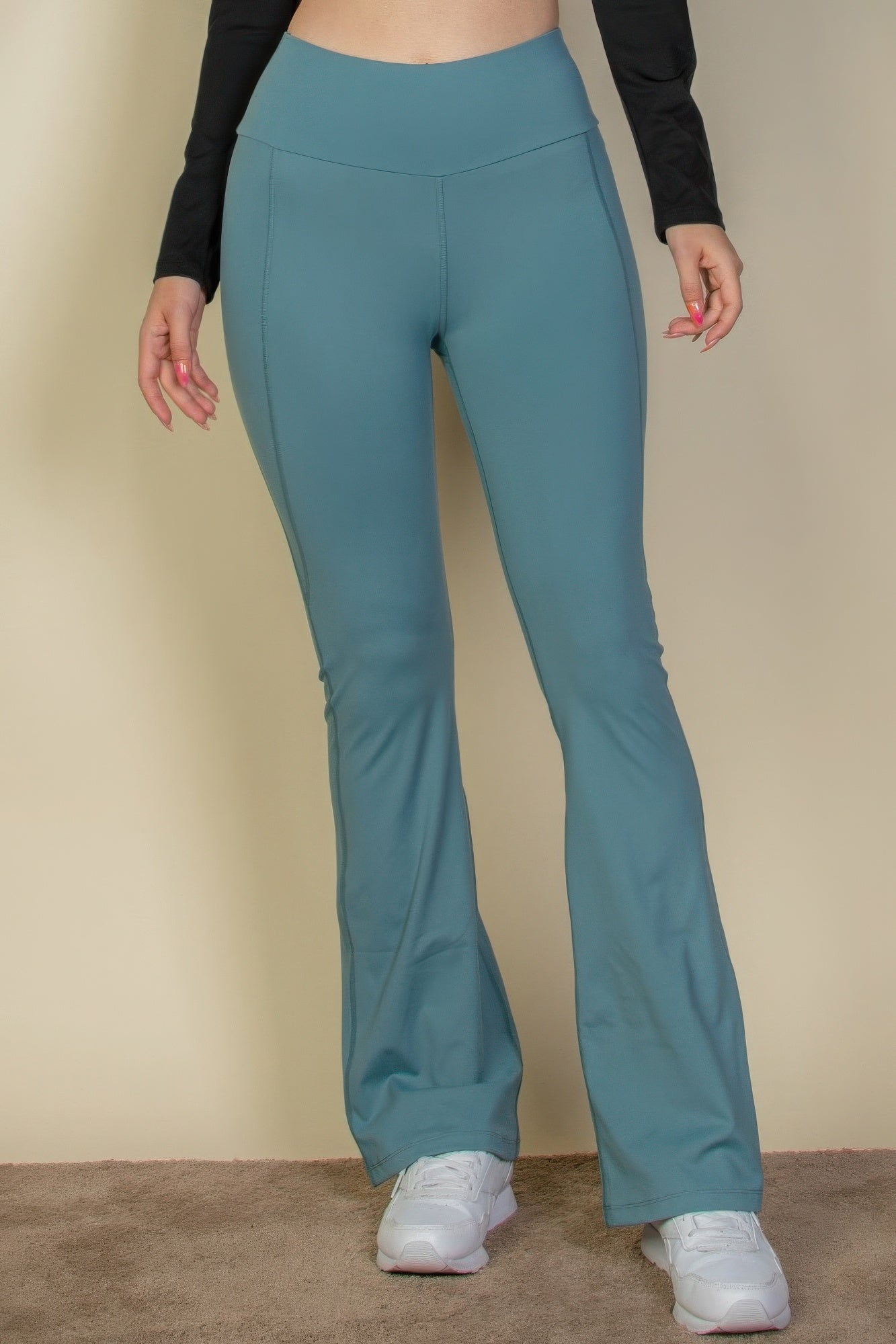 The Fiona is our wide waistband flare leg pants. These cute leggings are designed to offer both style and comfort, making them a versatile choice for any occasion. They can be paired with a fitted top for a polished look or a relaxed sweater for a more laid-back outfit. Crafted from a premium blend of 80% polyamide and 20% elastane. Colour: Slate Green.