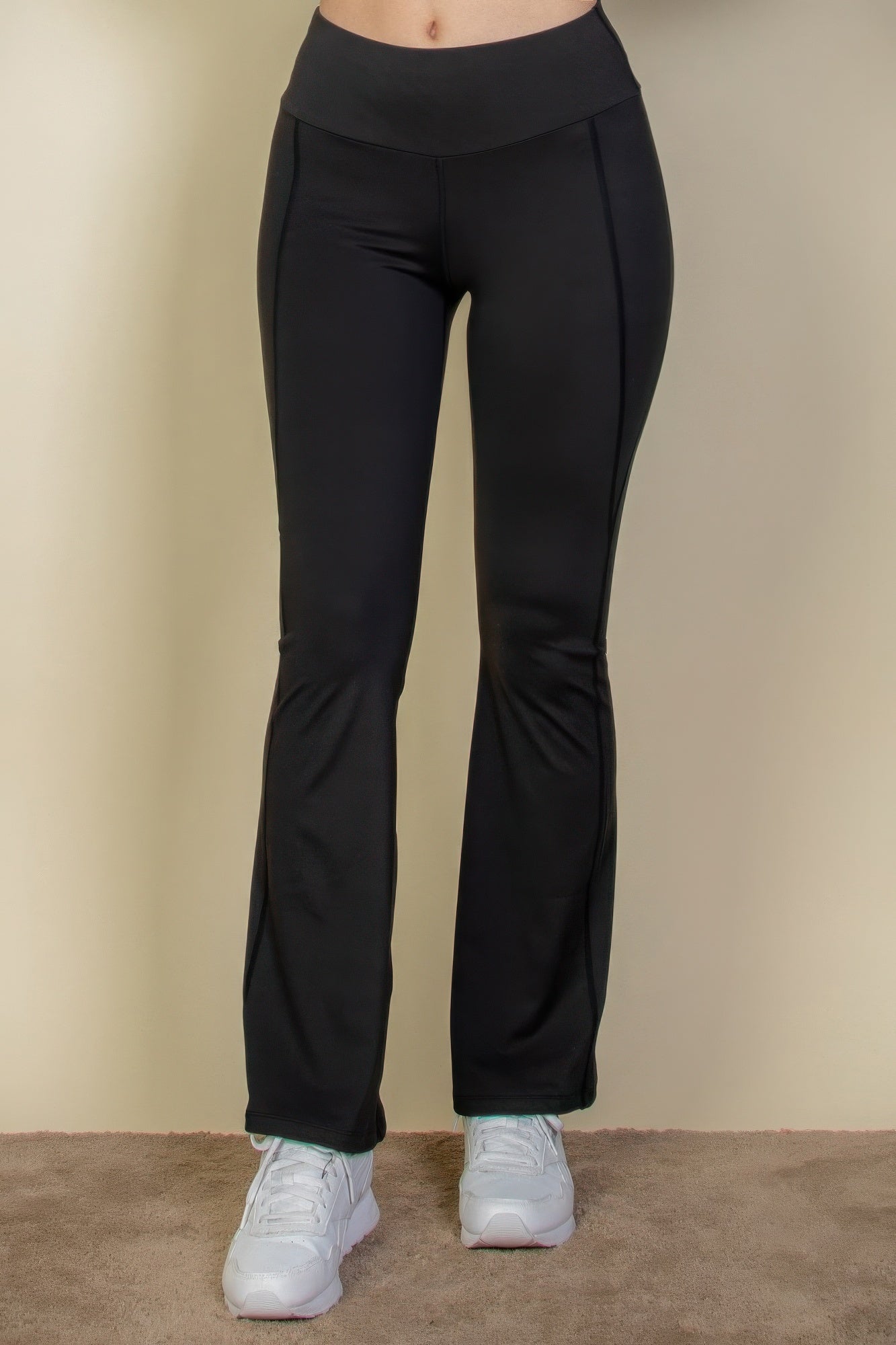 The Fiona is our wide waistband flare leg pants. These cute leggings are designed to offer both style and comfort, making them a versatile choice for any occasion. They can be paired with a fitted top for a polished look or a relaxed sweater for a more laid-back outfit. Crafted from a premium blend of 80% polyamide and 20% elastane. Colour: Black.