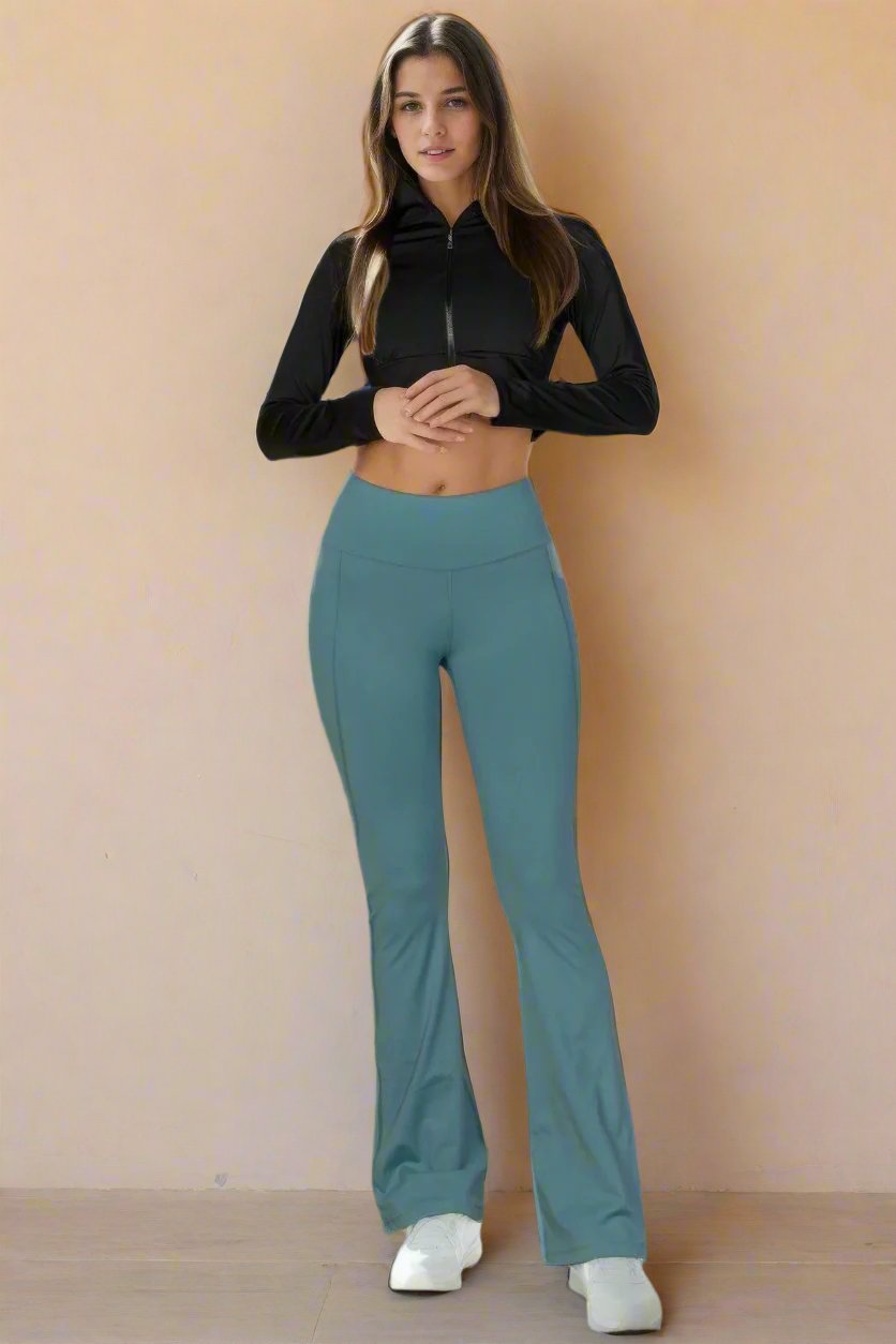 The Fiona is our wide waistband flare leg pants. These cute leggings are designed to offer both style and comfort, making them a versatile choice for any occasion. They can be paired with a fitted top for a polished look or a relaxed sweater for a more laid-back outfit. Crafted from a premium blend of 80% polyamide and 20% elastane. Colour: Slate Green.