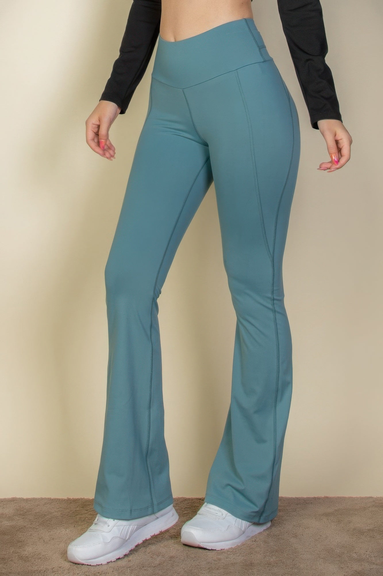 The Fiona is our wide waistband flare leg pants. These cute leggings are designed to offer both style and comfort, making them a versatile choice for any occasion. They can be paired with a fitted top for a polished look or a relaxed sweater for a more laid-back outfit. Crafted from a premium blend of 80% polyamide and 20% elastane. Colour: Slate Green.