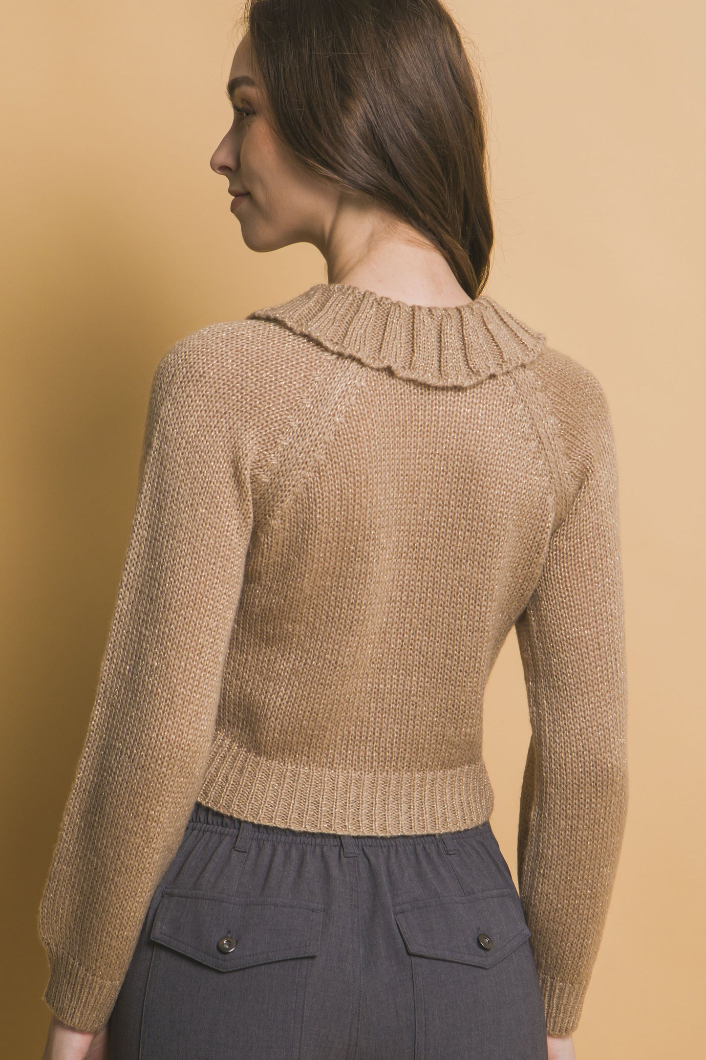 The Charlotte features a chic short collar and is crafted from a luxurious fabric blend. It is a timeless and versatile piece with a soft, durable, and subtly shimmering finish for a flattering fit and a refined look. Comfortable for all-day wear and perfect for both casual outings and formal events. Colour: Khaki.