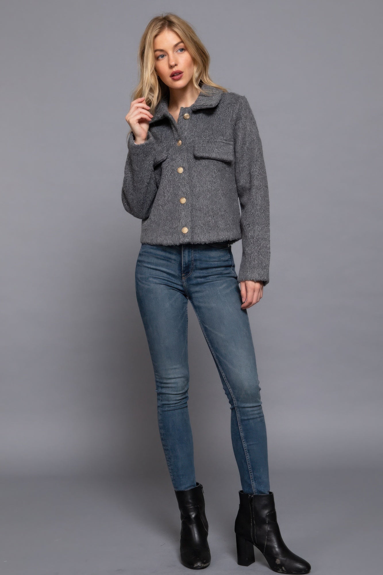 The Elsa is our long sleeve teddy fleece jacket that’s perfect for chilly days. Our jacket is designed for comfort, making it a go-to piece for everyday wear. Ideal for layering over tees or sweaters. Fabric: 100% polyester. Colour: heather charcoal.