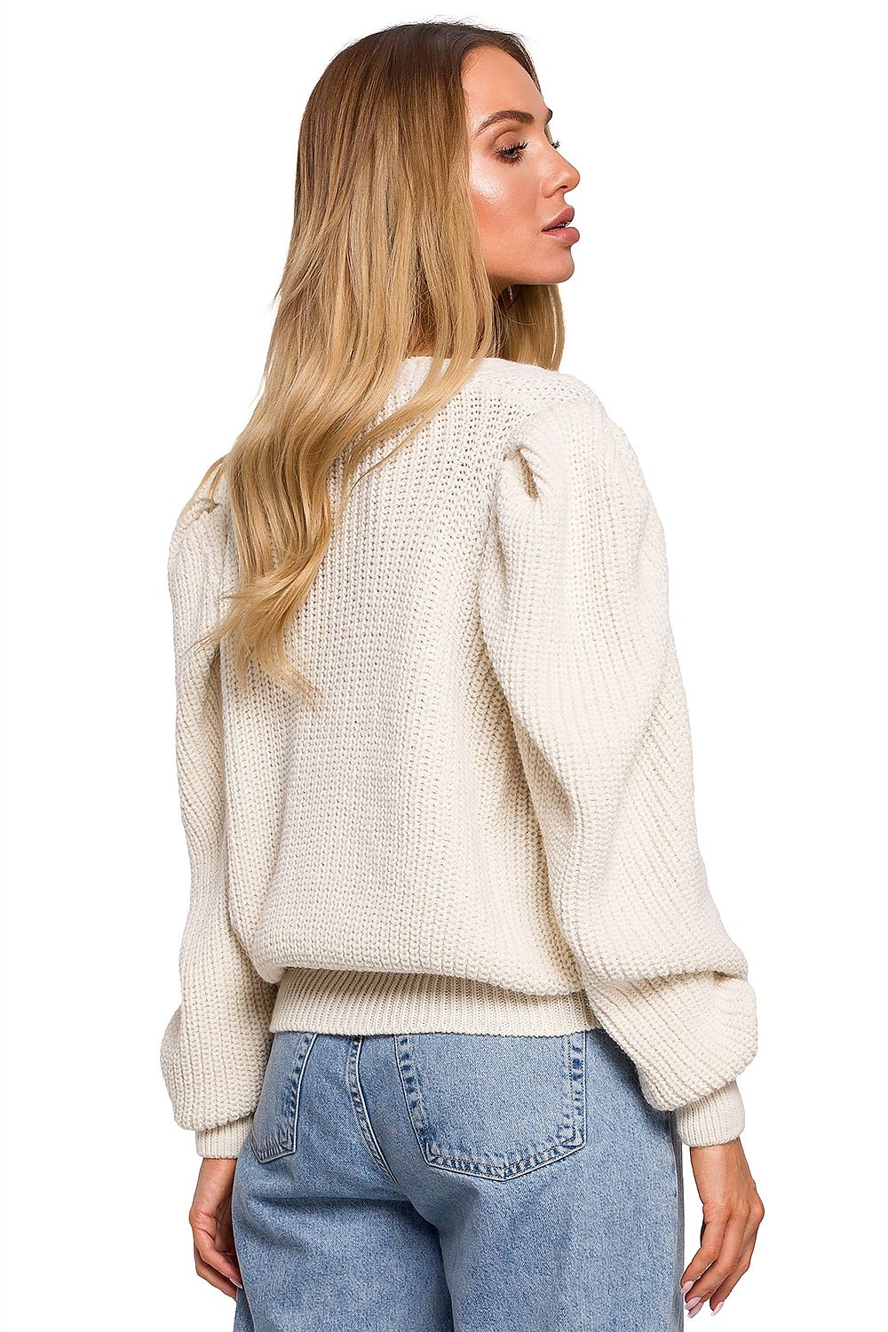 Short beige buttoned cardigan with interesting wide pockets. Perfect with trousers and skirts.