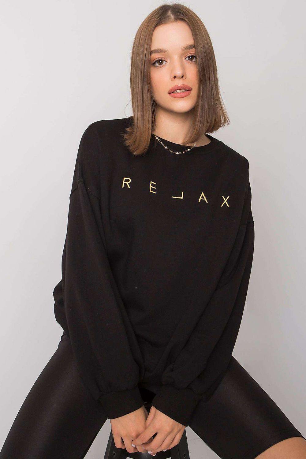 Black oversized crew neck sweatshirt. Perfect for everyday wear.