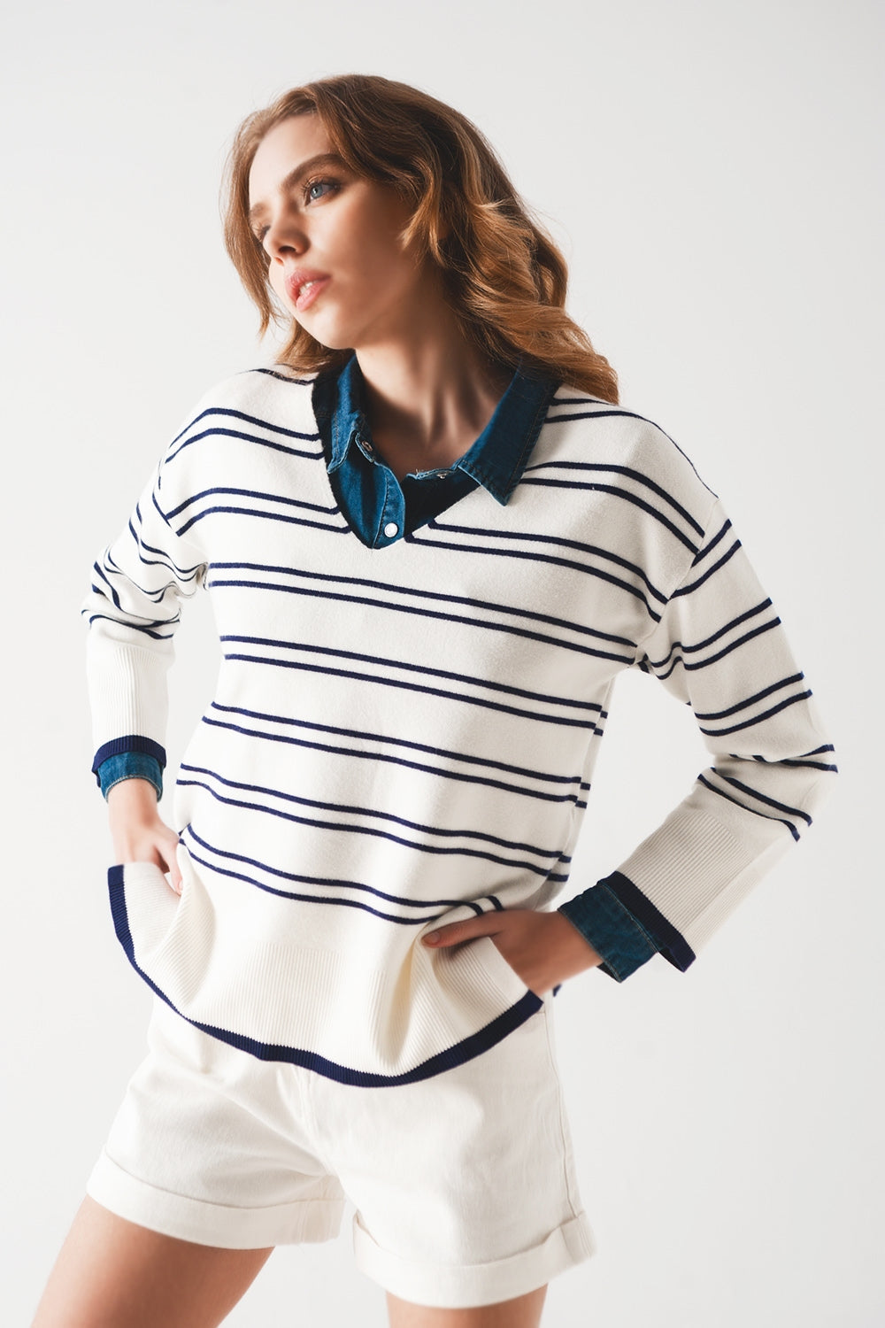 This Agnes sweater boasts a v-neck, long sleeves and a chic stripe design. It is crafted from a soft knit fabric with dropped armholes for extra comfort. This simple yet beautiful sweater runs true to size S. Colour: white with blue stripes.