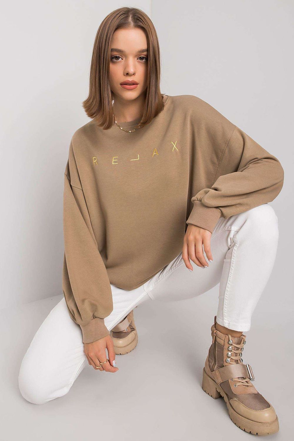 Brown oversized crew neck sweatshirt. Perfect for everyday wear.