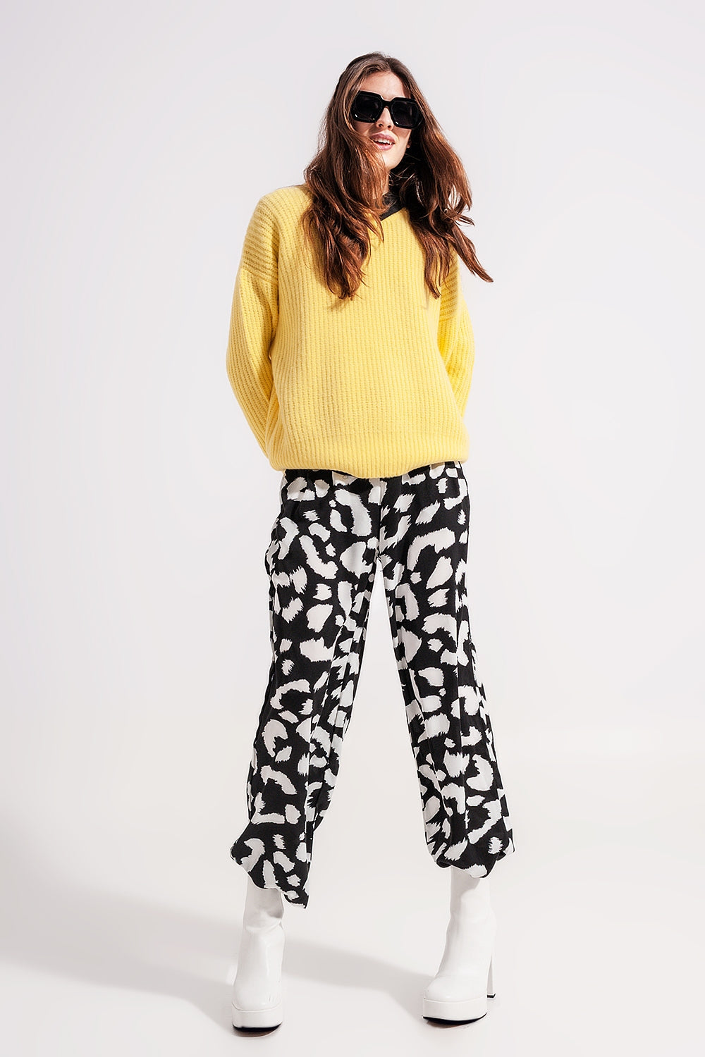 The Mellow Yellow is a casual, relaxed fit and ribbed chunky knit sweater with a crew neckline and long sleeves.