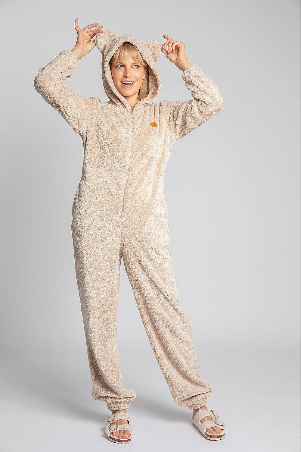 Plush beige overalls for special tasks! Cozy, wonderfully soft and with cute ears on the hood will certainly do for the chill and when it's gray outside!
