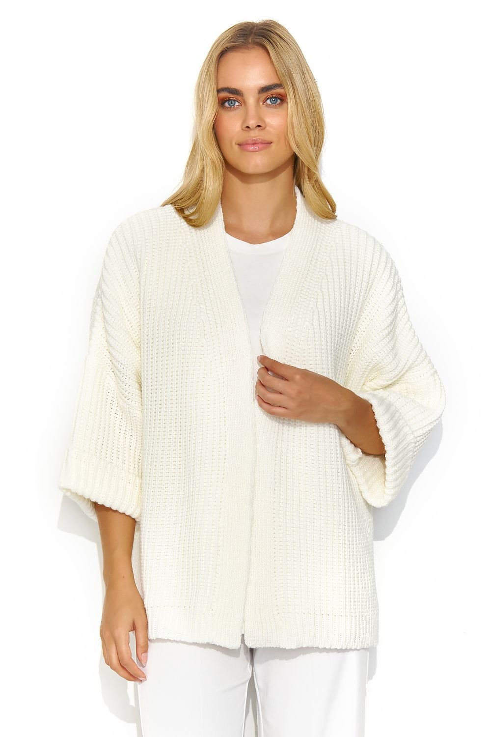 A white buttonless cardigan with wide sleeves and a lot of character. This cardigan has a uniform and regular pattern. It looks great when paired with a dress or a simple t-shirt and jeans. It is a versatile piece that adds exceptional class to both casual and more formal outfits. Made in Europe.
