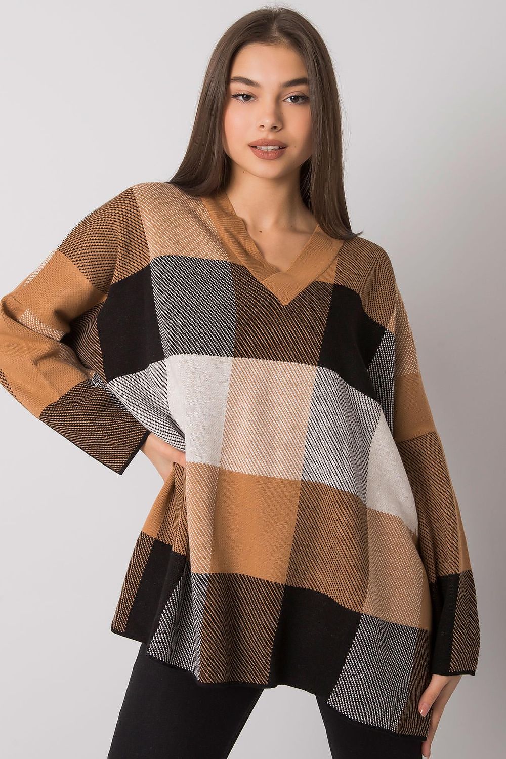 Camel loose-fitting patterned sweater with long sleeves.