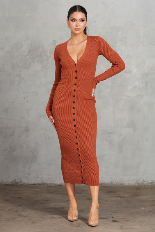 Enhance your style with The Nora, a gorgeous cognac bodycon dress. It features a button front, a V-neck, and long sleeves with thumbholes for a chic and contemporary look. Crafted from a premium blend of 43% viscose, 42% polyester, and 15% nylon, this dress offers a perfect combination of comfort and sophistication. Perfect for a night out, special events, or any occasion where you want to showcase your sophisticated style.