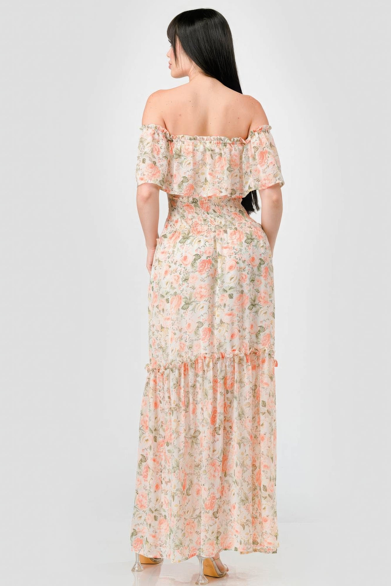 Elevate your wardrobe with The Sage, our floral chiffon maxi dress. It is a stunning piece that exudes elegance and grace. Crafted from 100% Polyester, this dress offers a lightweight and luxurious feel for all-day comfort. Made from high-quality chiffon fabric, The Sage ensures a delicate and flowy silhouette. It features an off-shoulder neckline with a smocked back and ruffled tiered detailing, offering a romantic and feminine look. Perfect for a range of occasions, from garden parties to beach weddings.