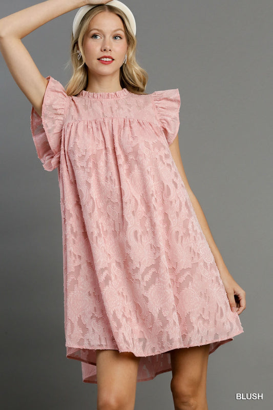 Introducing The Jacqueline, a graceful and charming addition to your wardrobe. Crafted from 100% polyester, this pink dress offers both style and comfort, perfect for any special occasion. This dress features an intricate jacquard lace detailing and delicate ruffle short sleeves, creating a romantic and cute look. Perfect for weddings, parties, or any special occasions, this dress can be paired with heels for a formal look or dressed down with flats for a more relaxed vibe.