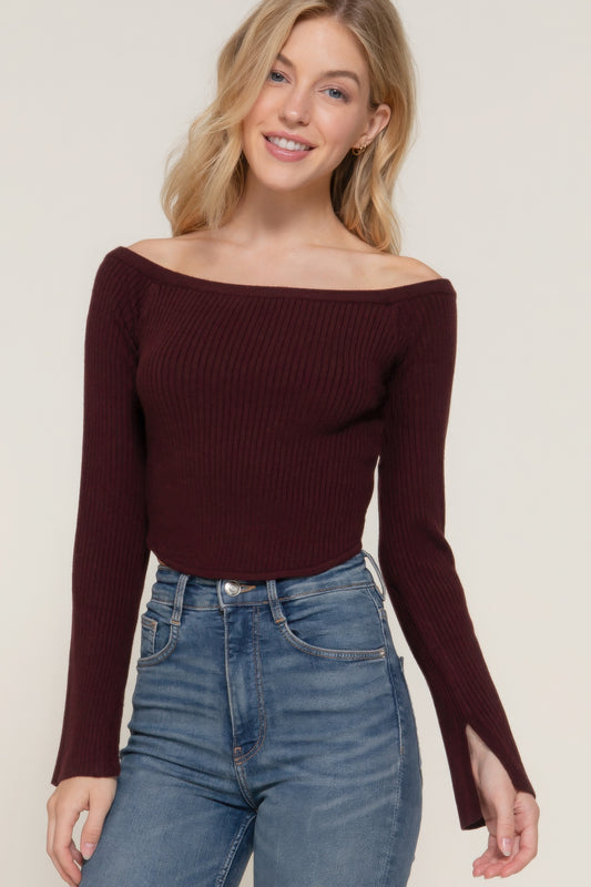 The Blair is our long flare sleeve off-shoulder sweater. This stunning piece is finished with a corset hem for a tailored look. Perfect for evening outings, casual events, or any occasion where you want to showcase an elegant look. Fabric: Made from 49% viscose, 28% polyester, and 23% nylon. Colour: maroon.