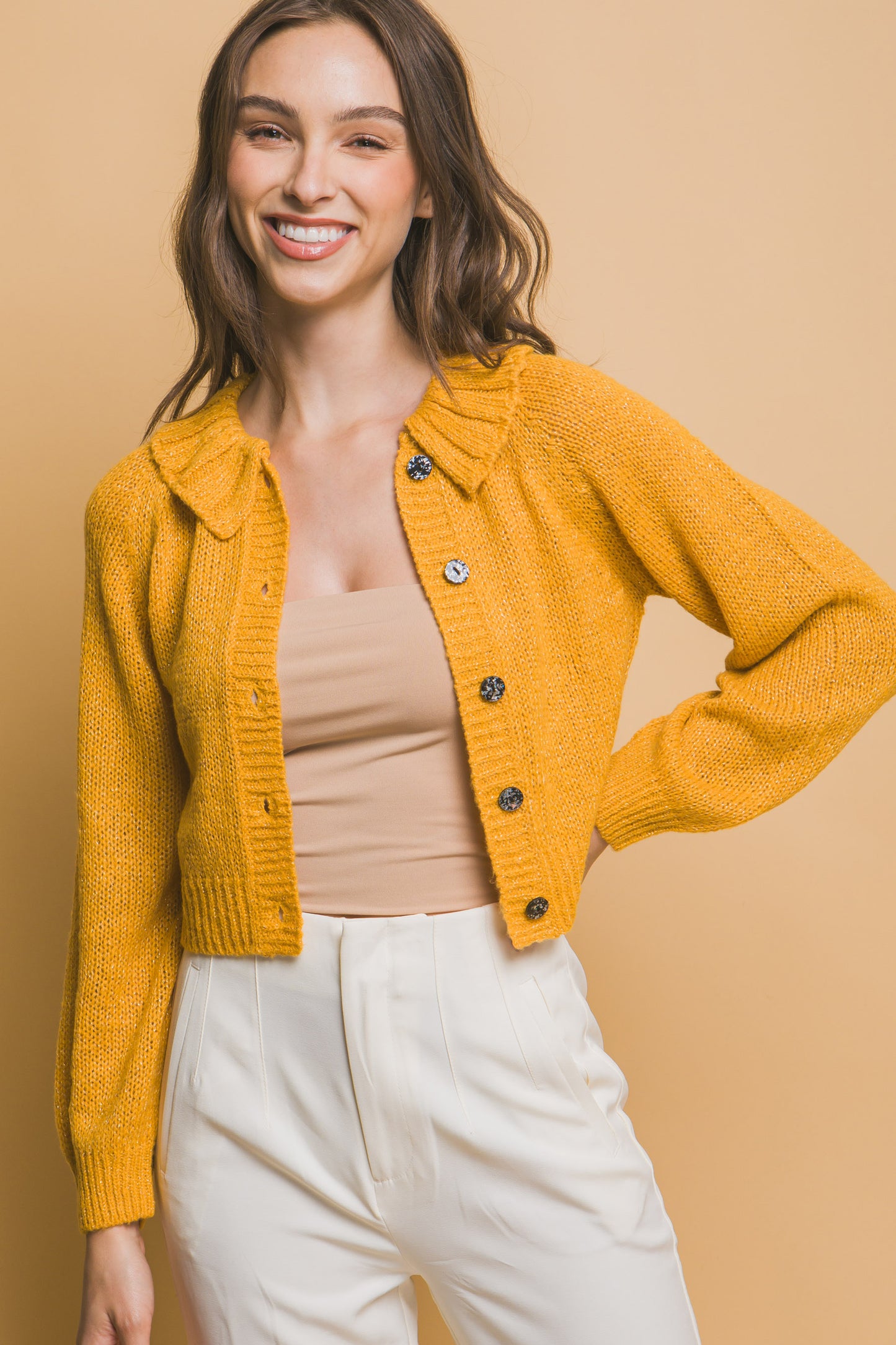 The Charlotte features a chic short collar and is crafted from a luxurious fabric blend. It is a timeless and versatile piece with a soft, durable, and subtly shimmering finish for a flattering fit and a refined look. Comfortable for all-day wear and perfect for both casual outings and formal events. Colour: Yellow.