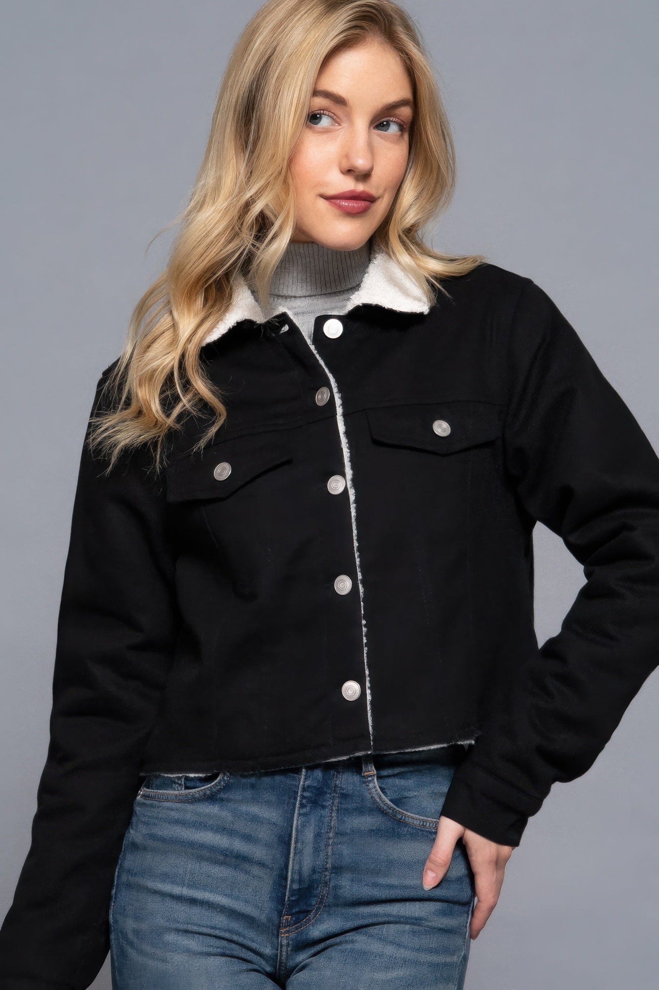 The Anna is our button down sherpa-lined twill jacket, ideal for cooler days. Each jacket is expertly stitched to ensure a quality finish. Perfect for layering over sweaters or tees, this jacket can be dressed up or down for any occasion. Fabric: 100% Cotton. Colour: black.