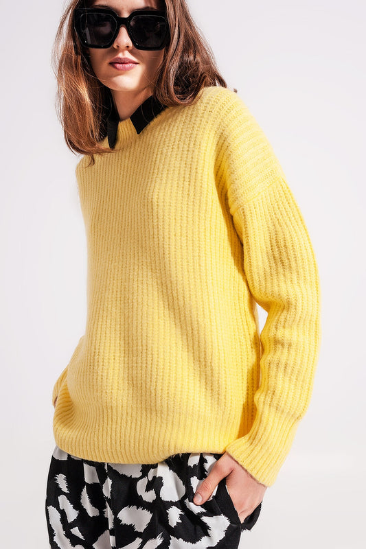 The Mellow Yellow is a casual, relaxed fit and ribbed chunky knit sweater with a crew neckline and long sleeves.