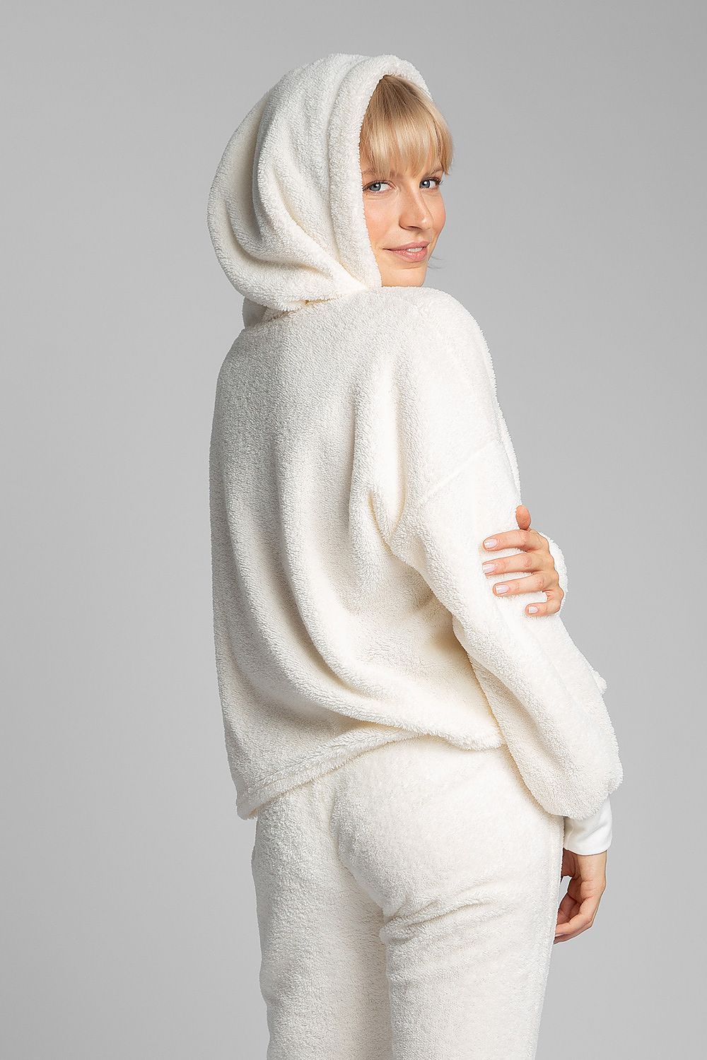 This beige heavenly lightweight, fluffy plush hoodie is a must-have for your home wardrobe. It can also be a comfortable option for going out. Colour: White.