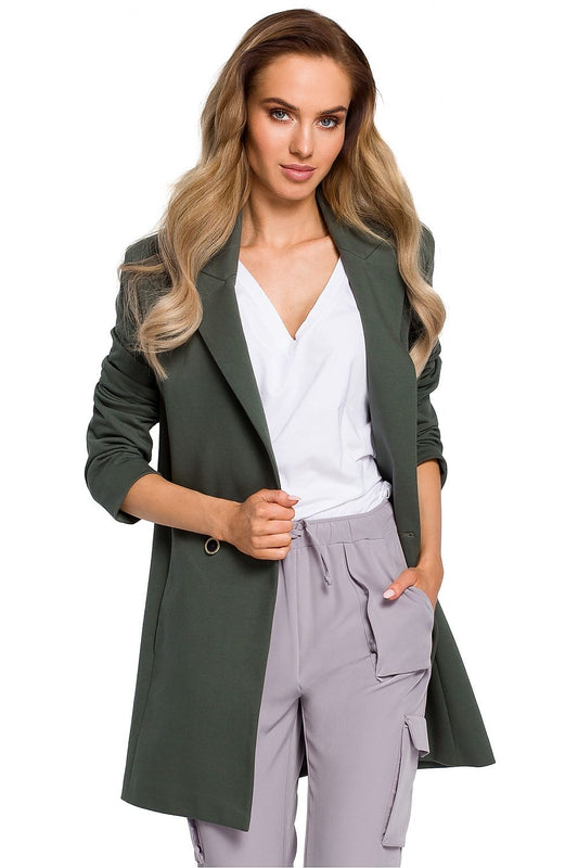 Elegant yet casual double-breasted jacket. This green knitted jacket is suitable both for everyday wear with jeans and for more elegant outfits. Slip pockets on the front, fully lined.