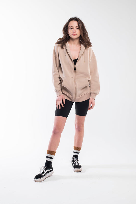 Oversized hoodie with a lined drawstring hood, front zip and kangaroo pockets for keeping your stuff secure. It has a relaxed design with dropped shoulders, long sleeves and handwriting embroidery on the wrist.  This product is manufactured from surplus fabrics with minimum environmental impact where child labour is strictly prohibited and regular employment policies are applied.