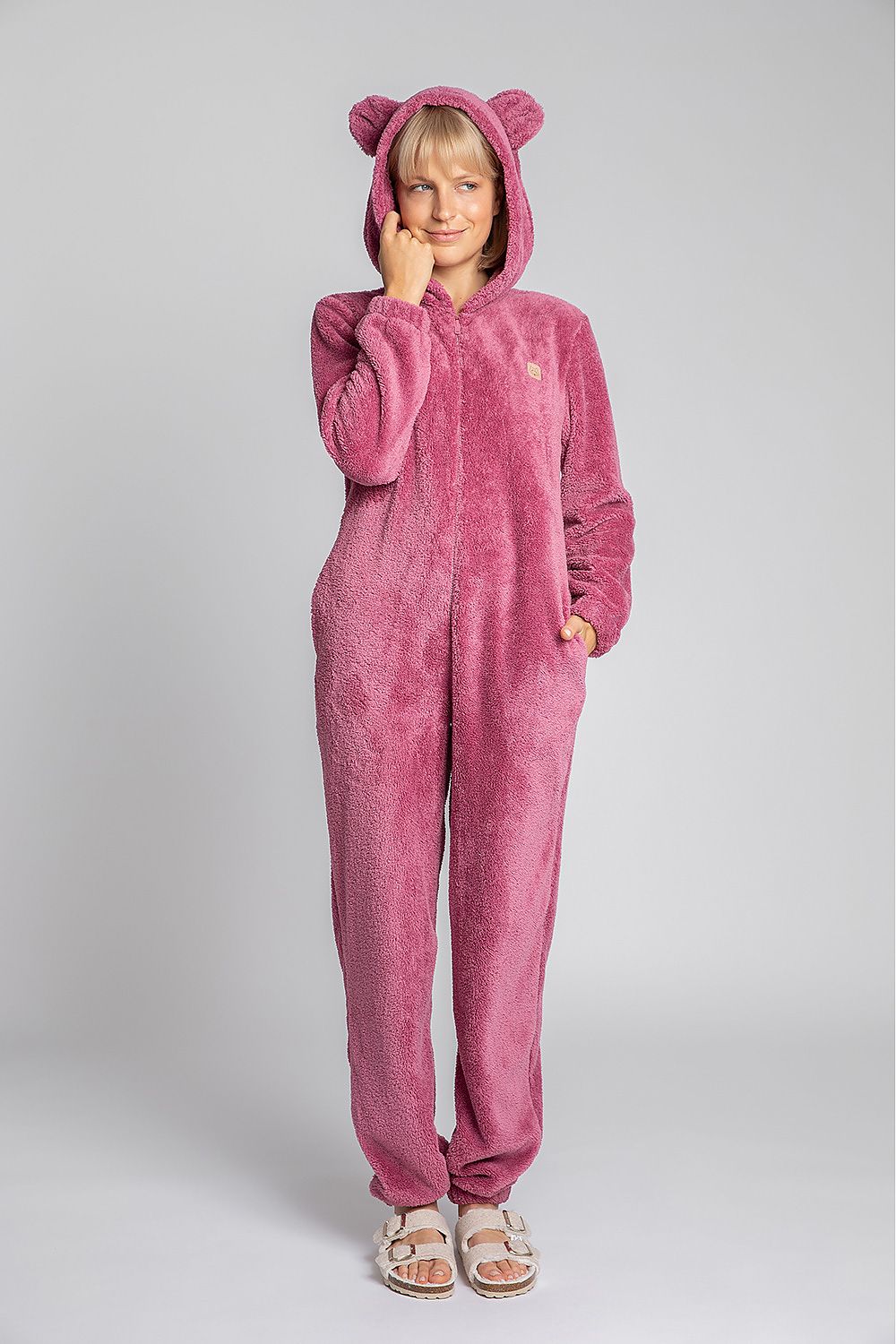 Plush pink overalls for special tasks! Cozy, wonderfully soft and with cute ears on the hood will certainly do for the chill and when it's gray outside!